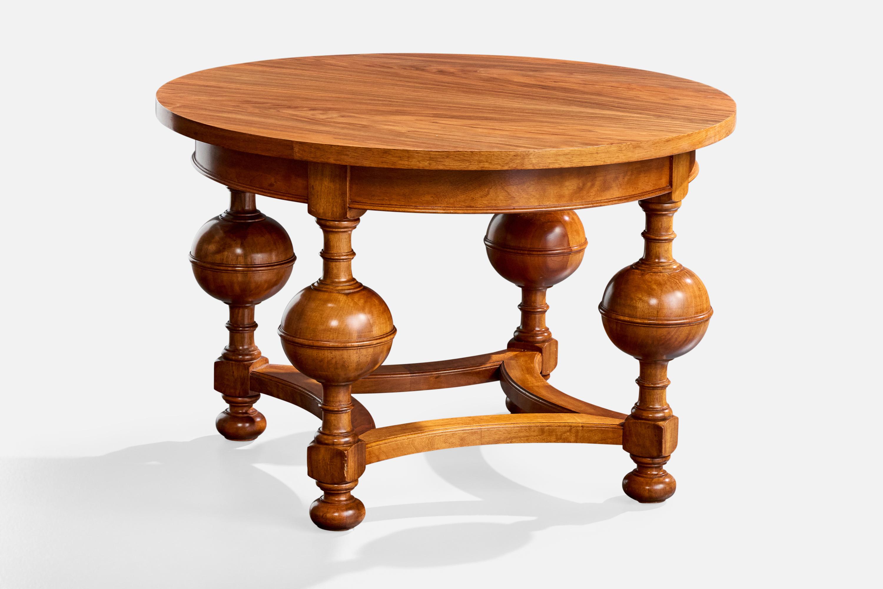 A wood side table designed and produced in Sweden, c. 1930s.

Recently refinished.

Overall Dimensions (inches): 24.0
