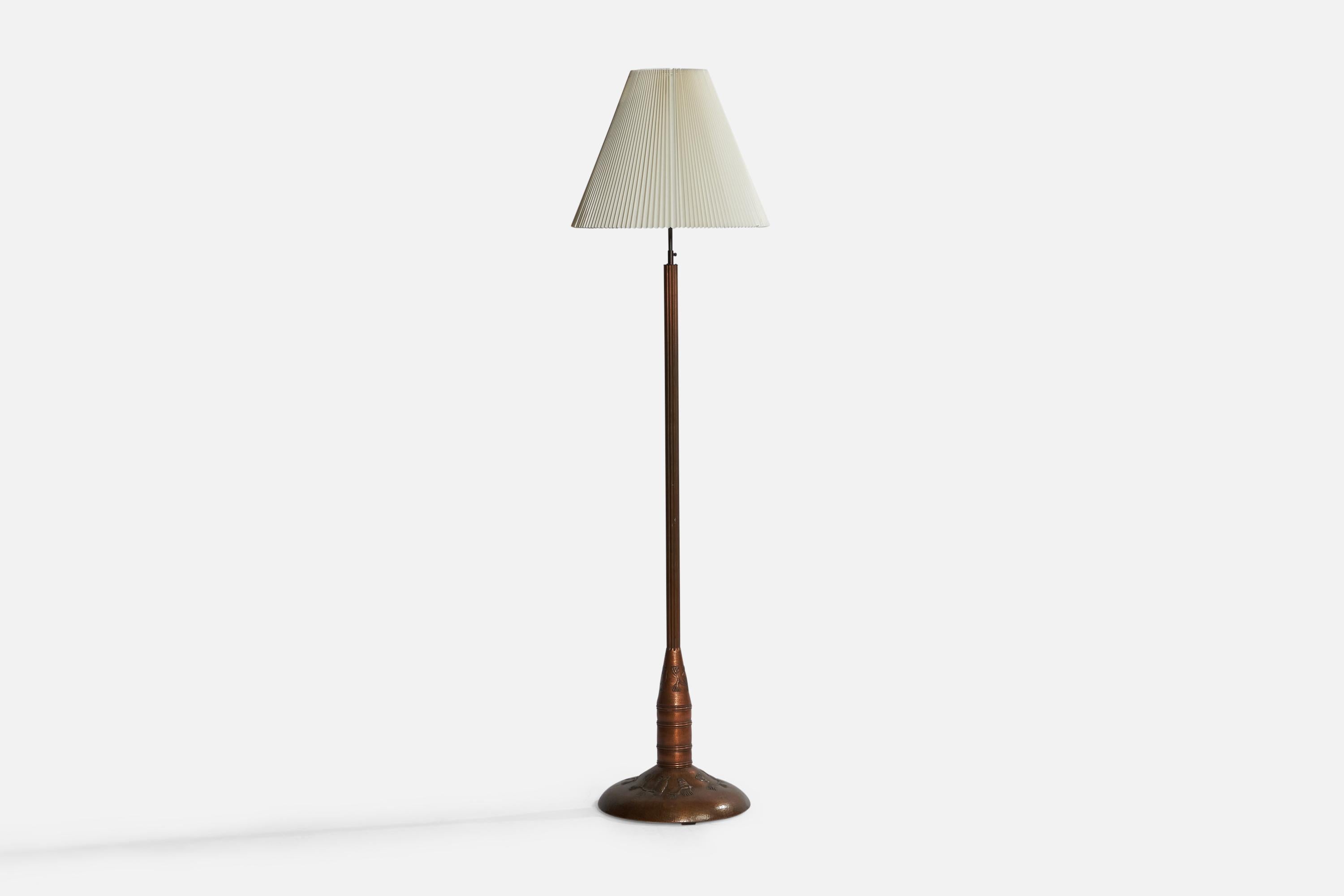 A sizeable copper, brass and paper floor lamp designed and produced in Sweden, 1920s.

Overall Dimensions (inches): 78.75” H x 20.75” Diameter. Stated dimensions include shade.
Bulb Specifications: E-26 Bulbs
Number of Sockets: 2
All lighting will