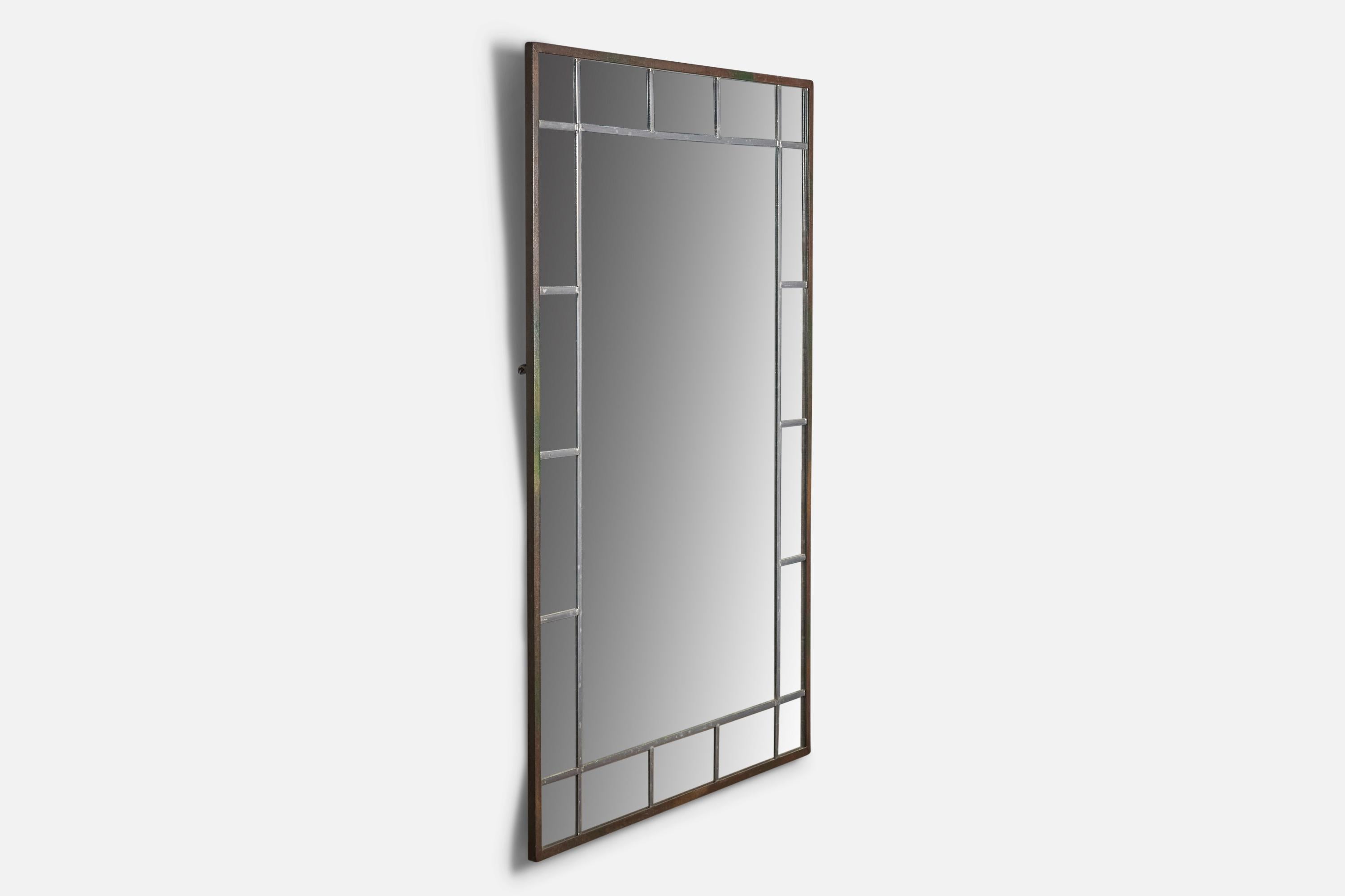 A sizeable copper and pewter wall mirror designed and produced in Sweden, c. 1940s.