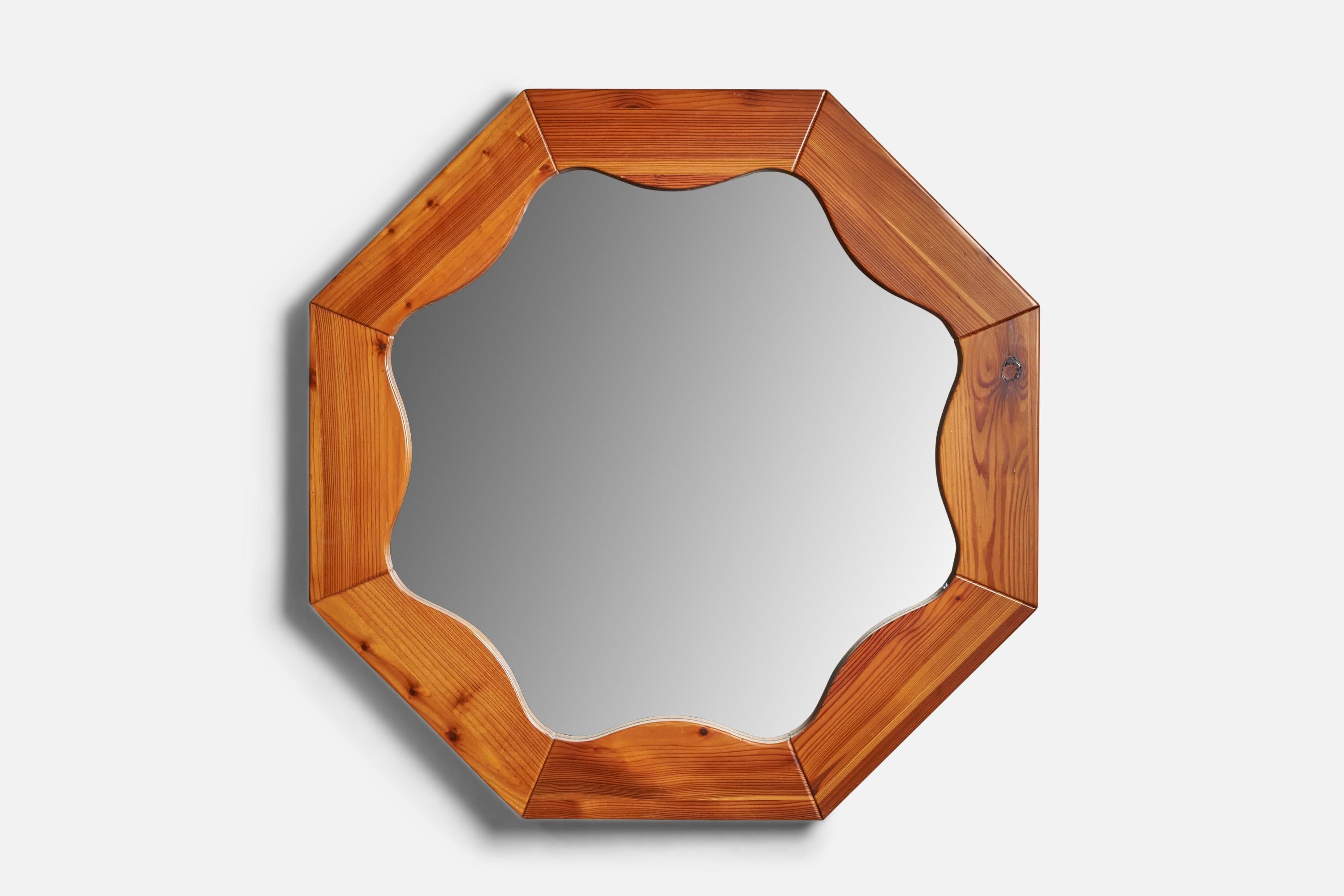 A sizeable wall mirror designed and produced in Sweden, c. 1970s.