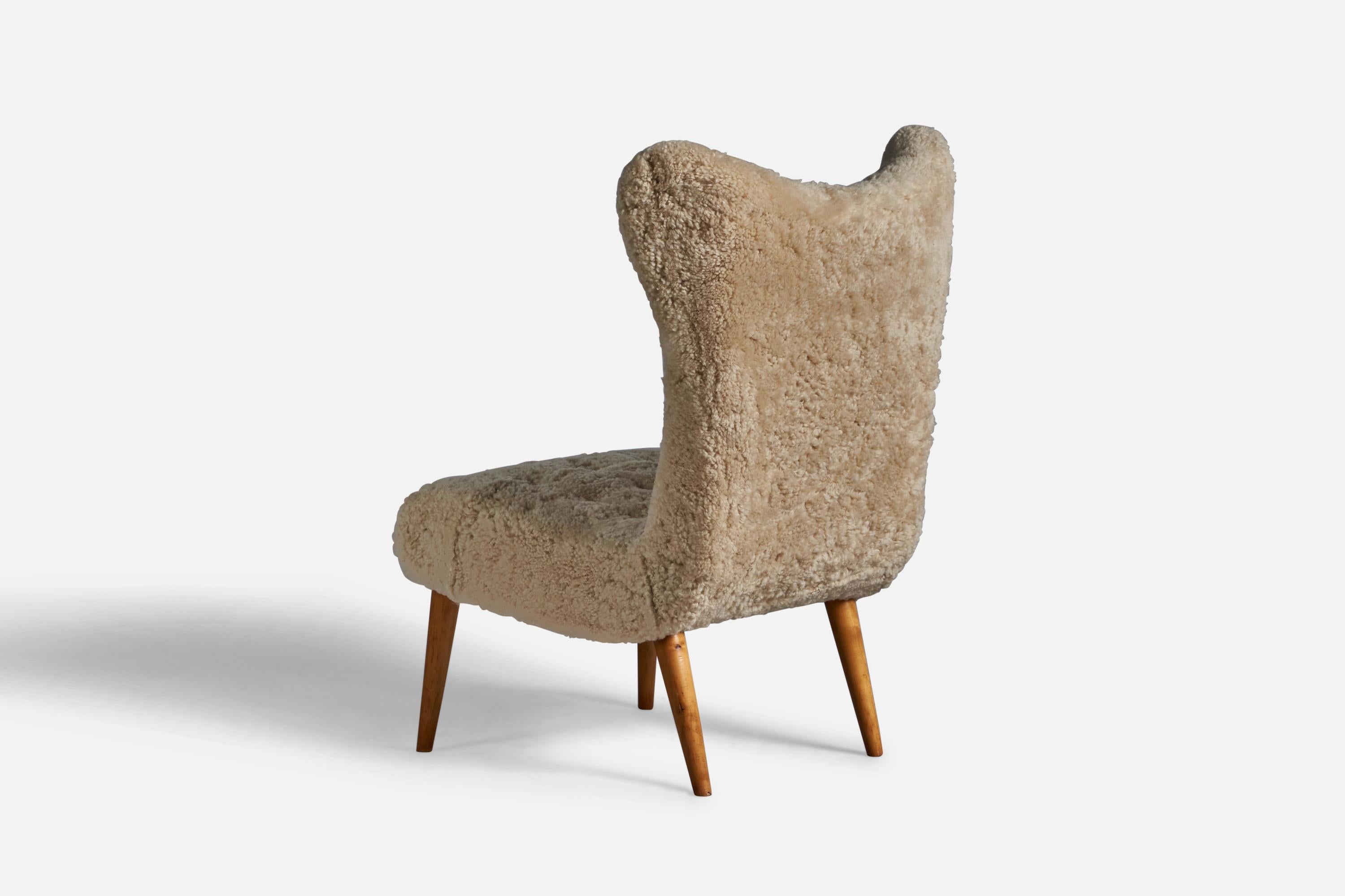 Mid-20th Century Swedish Designer, Slipper Chair, Shearling, Wood, Sweden, 1950s