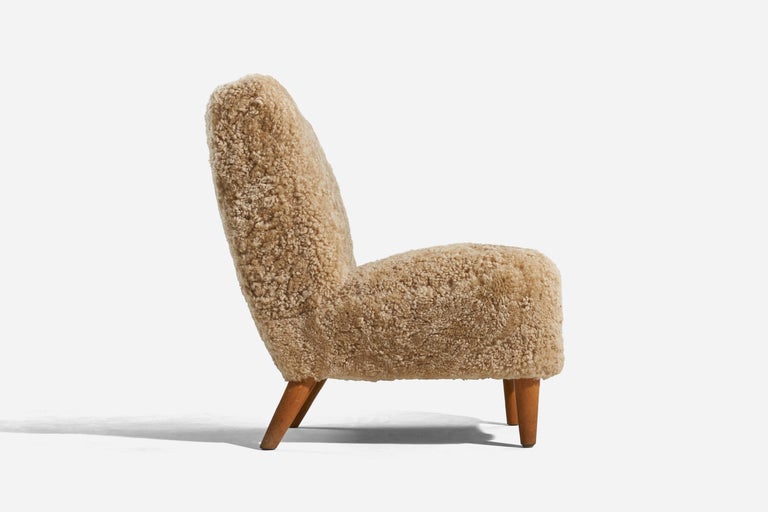 Mid-20th Century Swedish Designer, Slipper Chairs, Sheepskin, Wood, Sweden, 1940s For Sale
