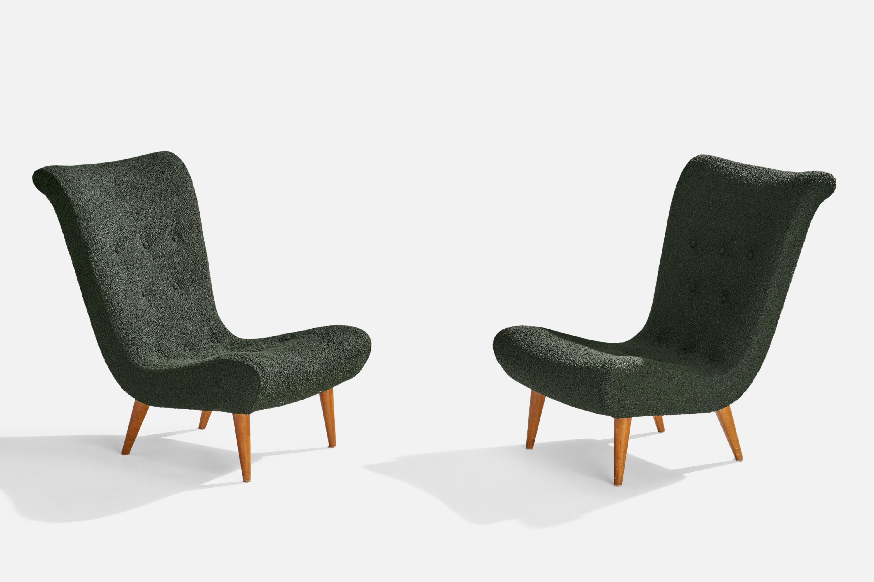 A pair of green bouclé fabric and wood slipper chairs designed and produced in Sweden, c. 1950s.

Seat height 13.5”