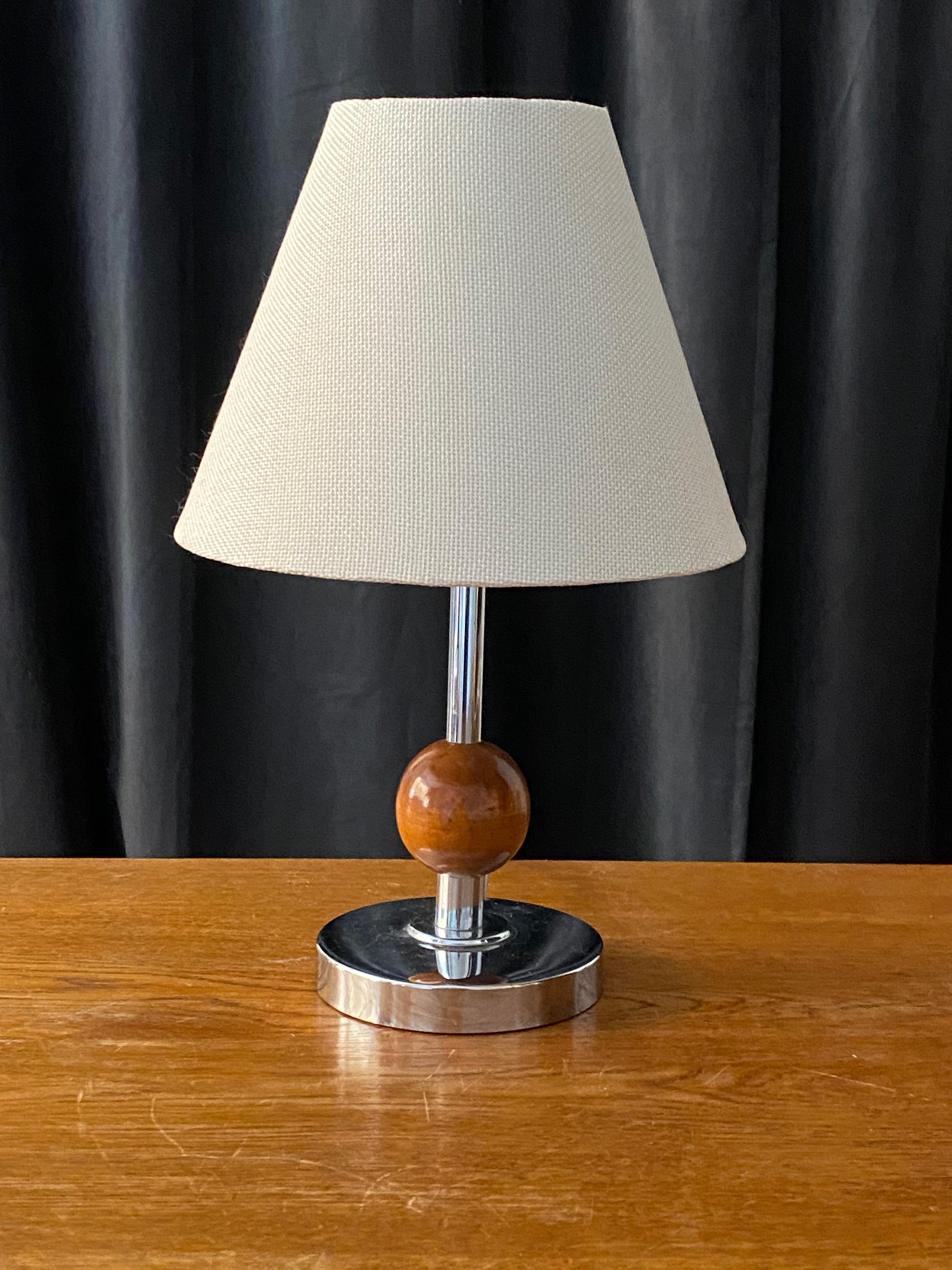 A table lamp, designed and produced in Sweden, 1930s. With lively original patina. Sold excluding Lampshade that is mounted on bulb-clip. Stated measurements are excluding lampshade and lightbulb.

Other designers of the period include Josef