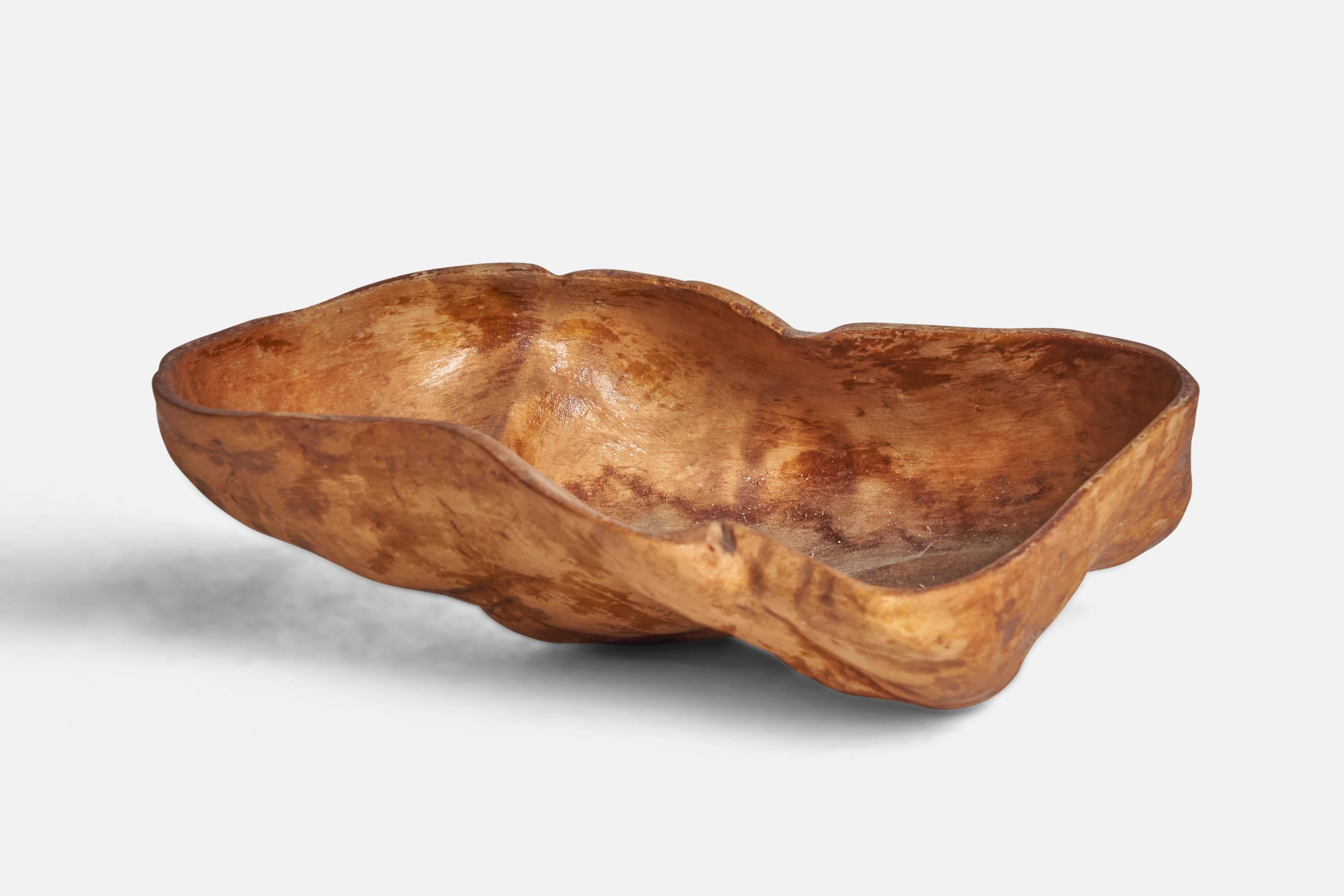A small burl wood bowl designed and produced in Sweden, c. 1960s.