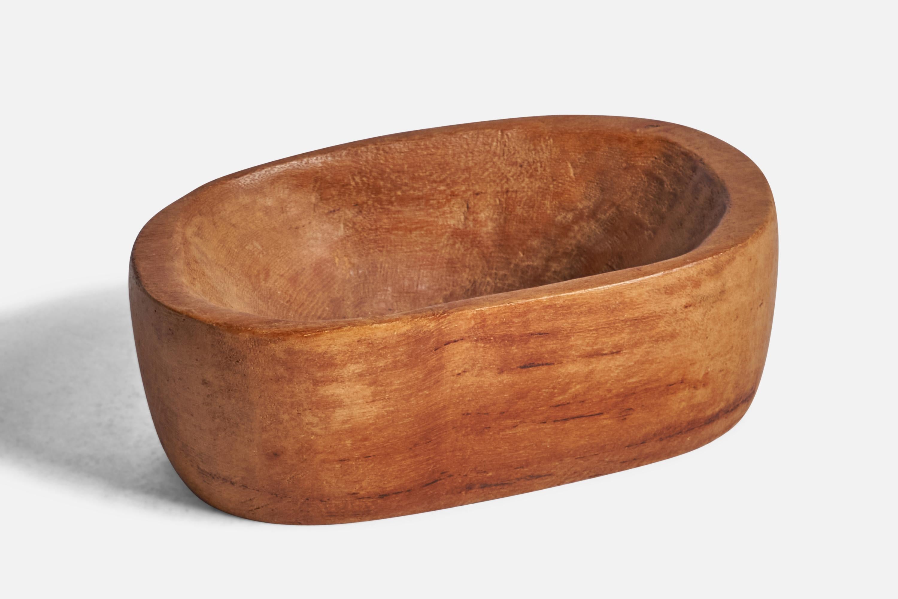 A small hand-carved bowl designed and produced in Sweden, c. 1940s.