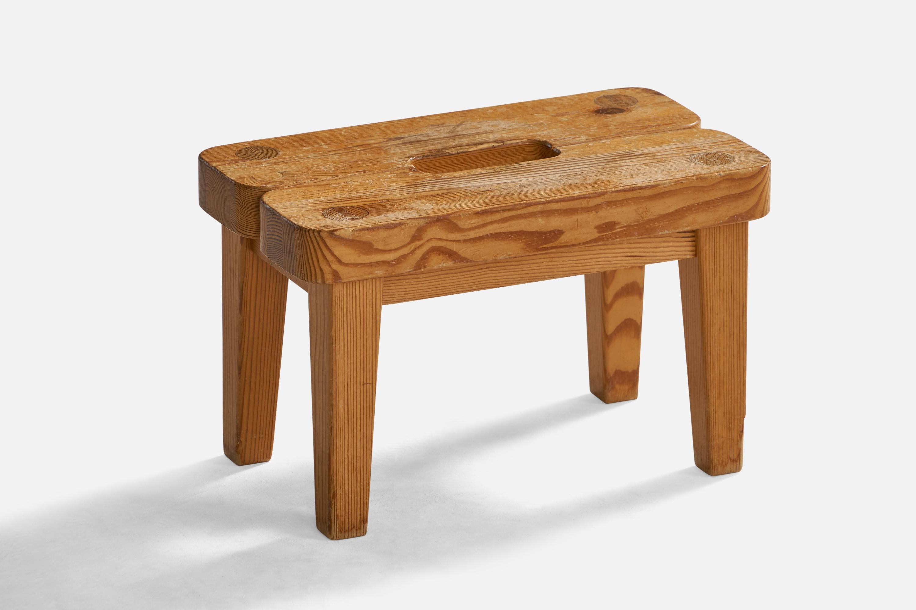 A small pine stool designed and produced in Sweden, c. 1960s.

Seat height: 8.65”