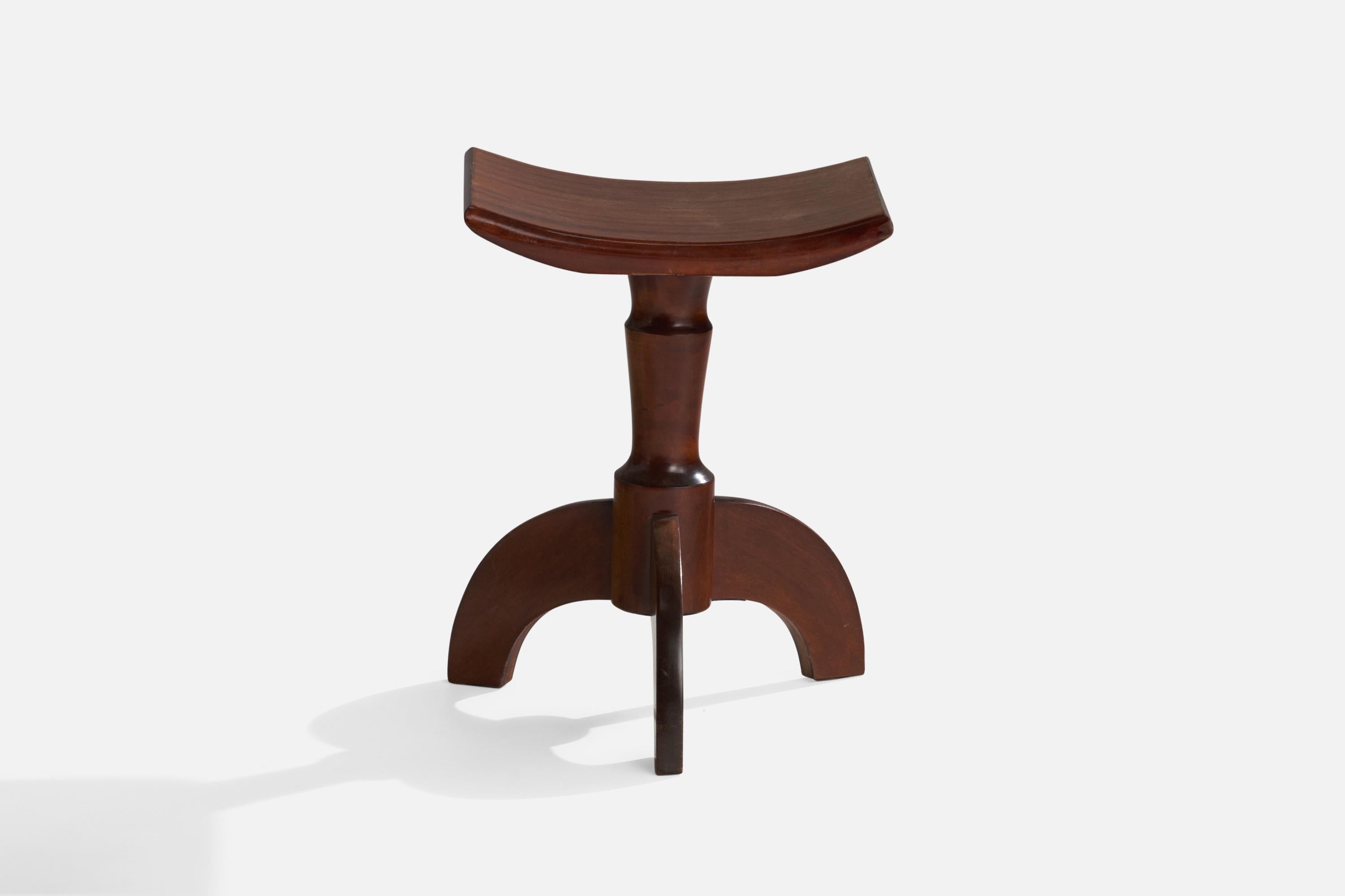 A dark-stained birch stool designed and produced in Sweden, 1930s.