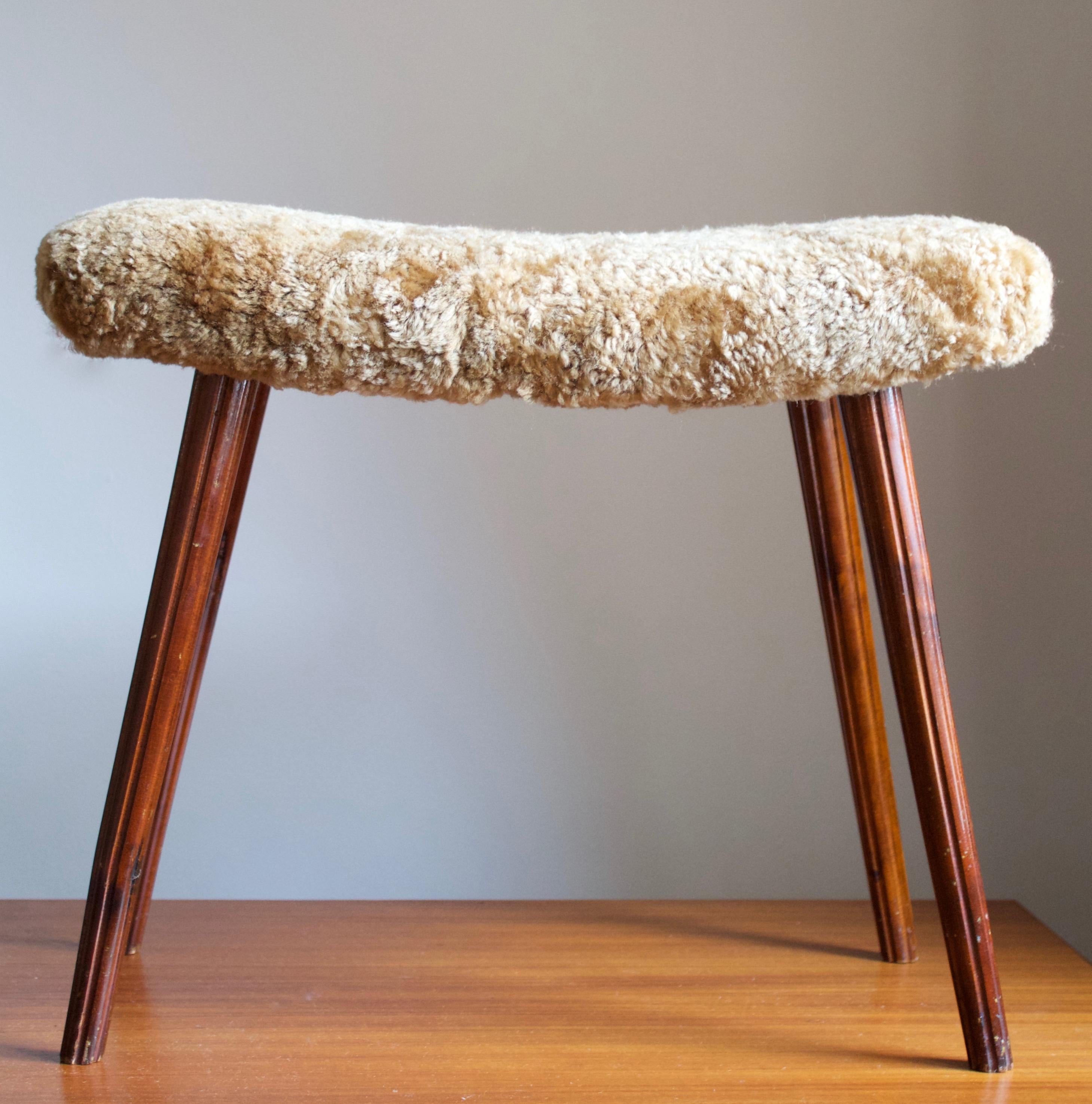 Swedish Designer, Stool, Dark-Stained Wood, Sheepskin, Sweden, 1950s In Good Condition In High Point, NC