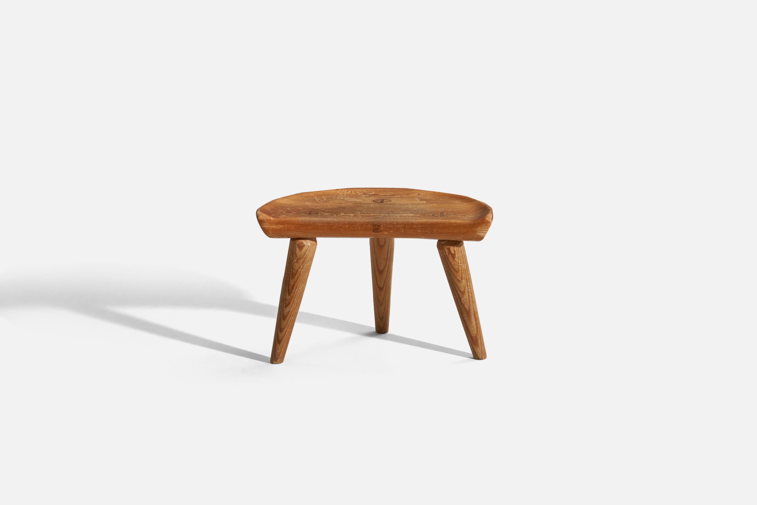 A pine stool designed and produced in Sweden, 1950s.





