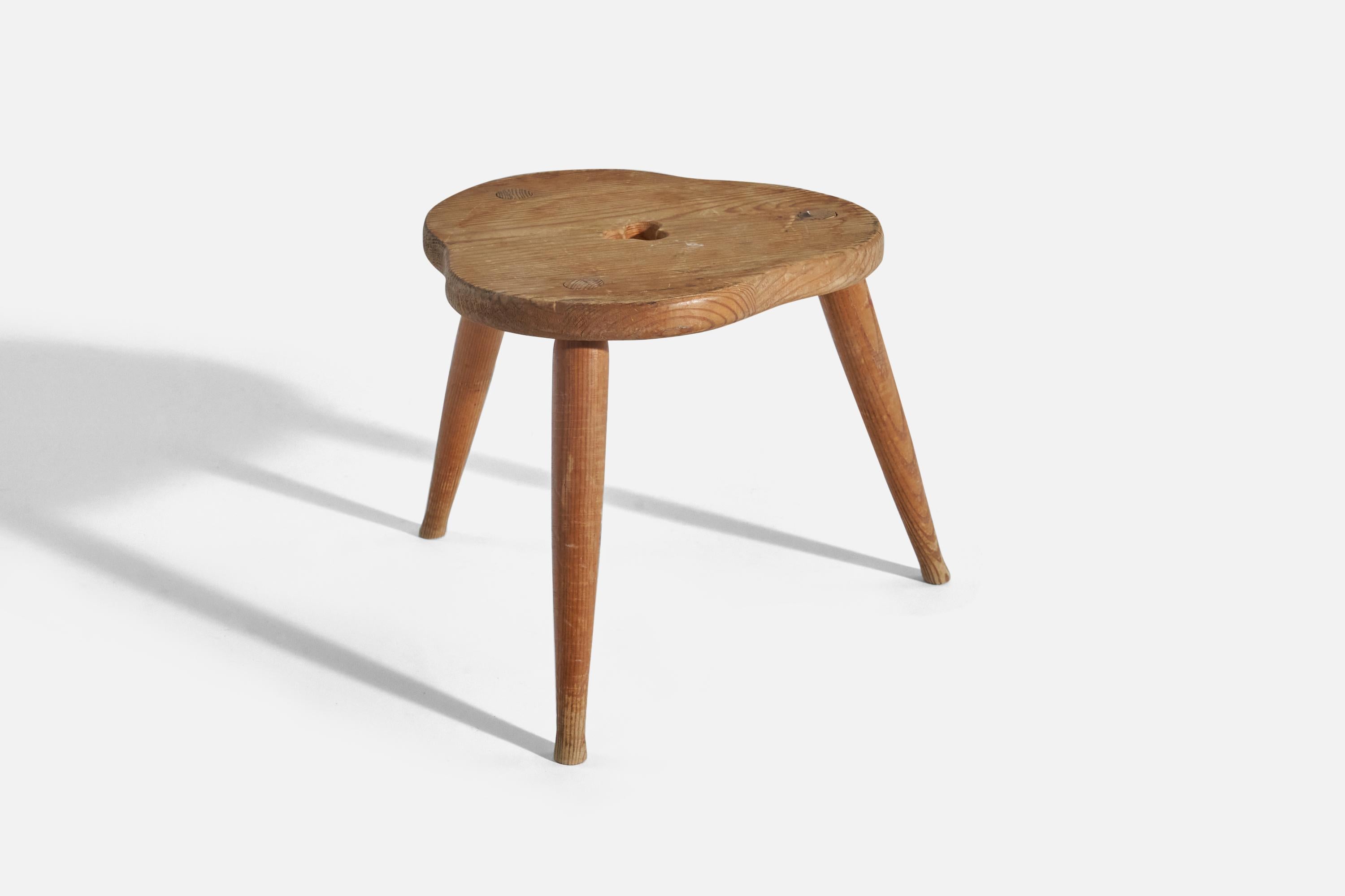 A solid pine stool designed and produced in Sweden, c. 1960s.