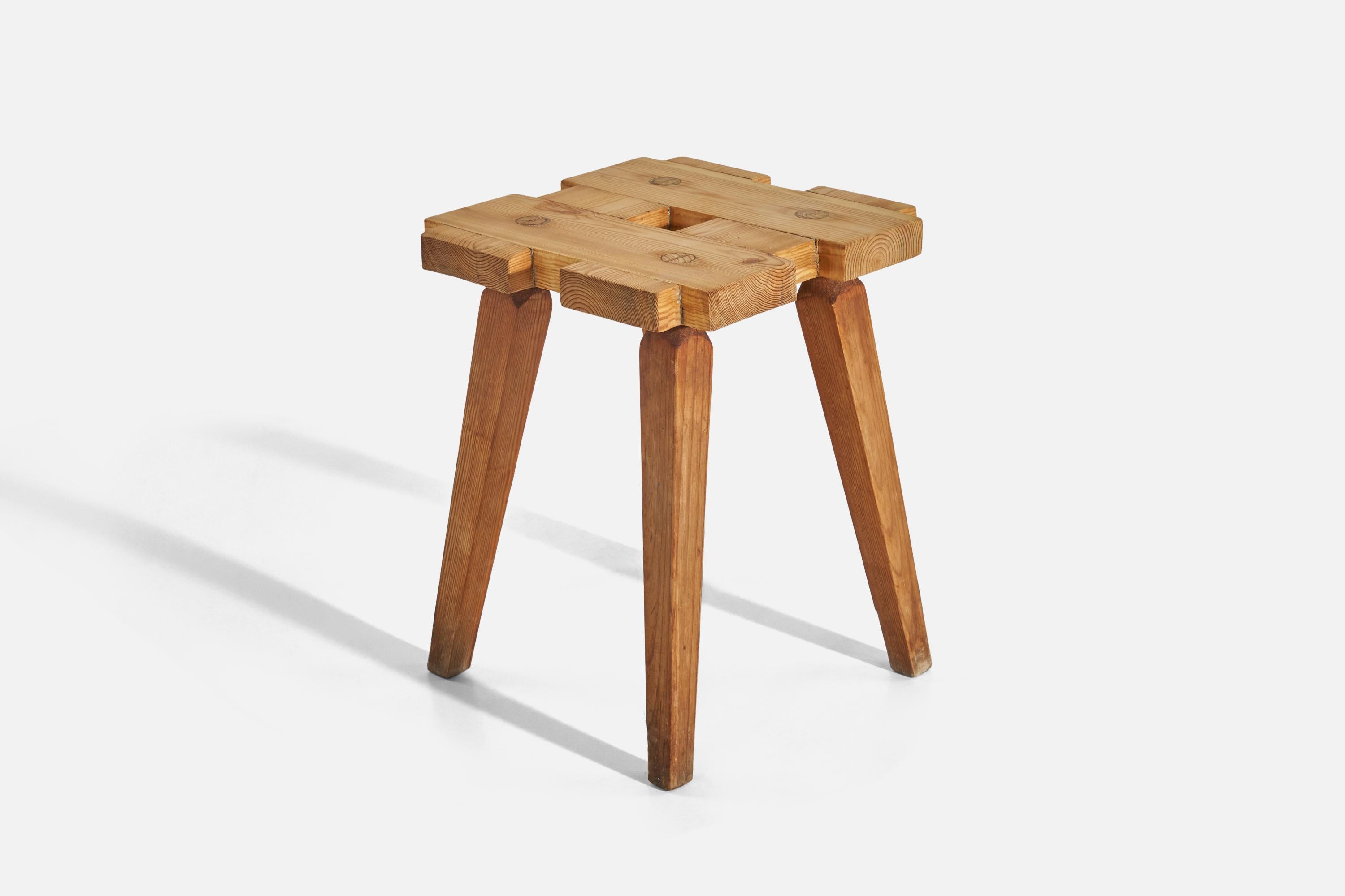 A solid pine stool designed and produced in Sweden, c. 1960s.