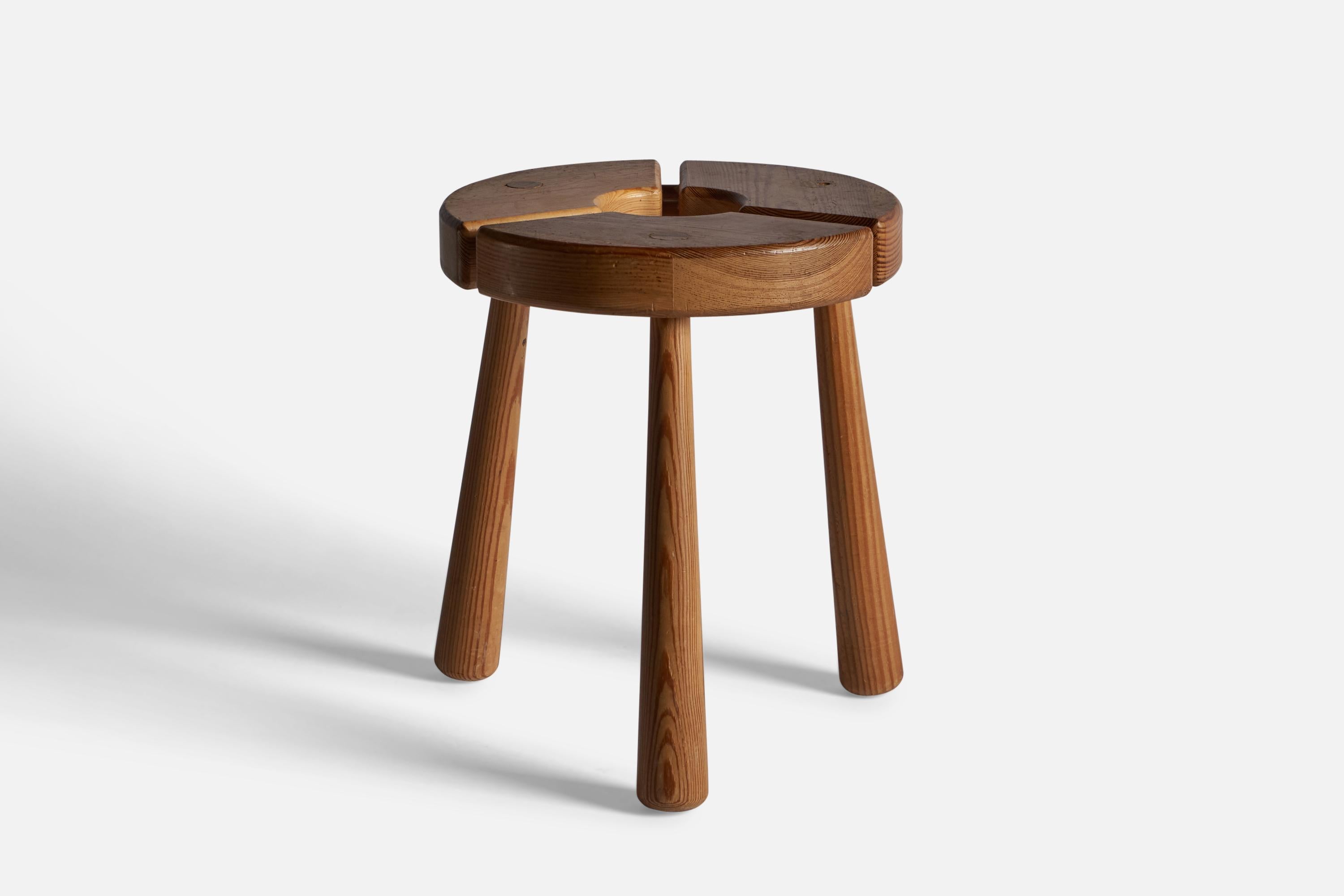A solid pine stool, designed and produced in Sweden, c. 1960s.