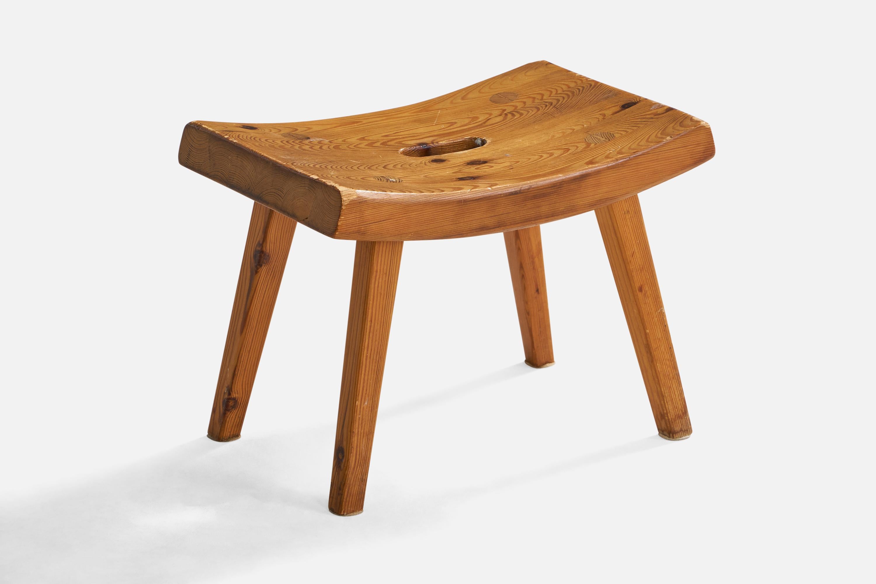A small pine stool designed and produced in Sweden, c. 1960s.
Seat height: 10.25”