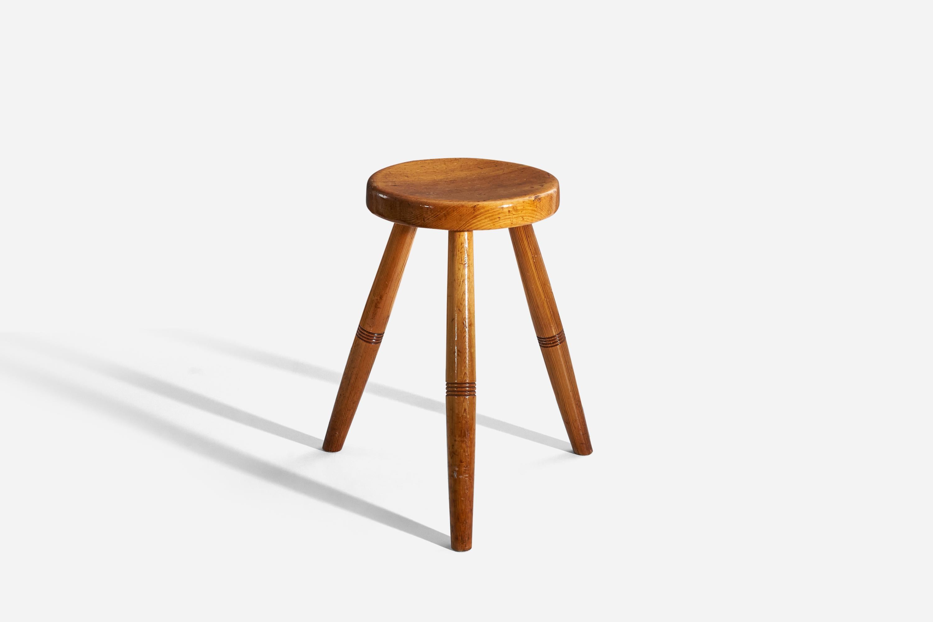 A solid pine wood stool designed and produced in Sweden, c. 1970s.