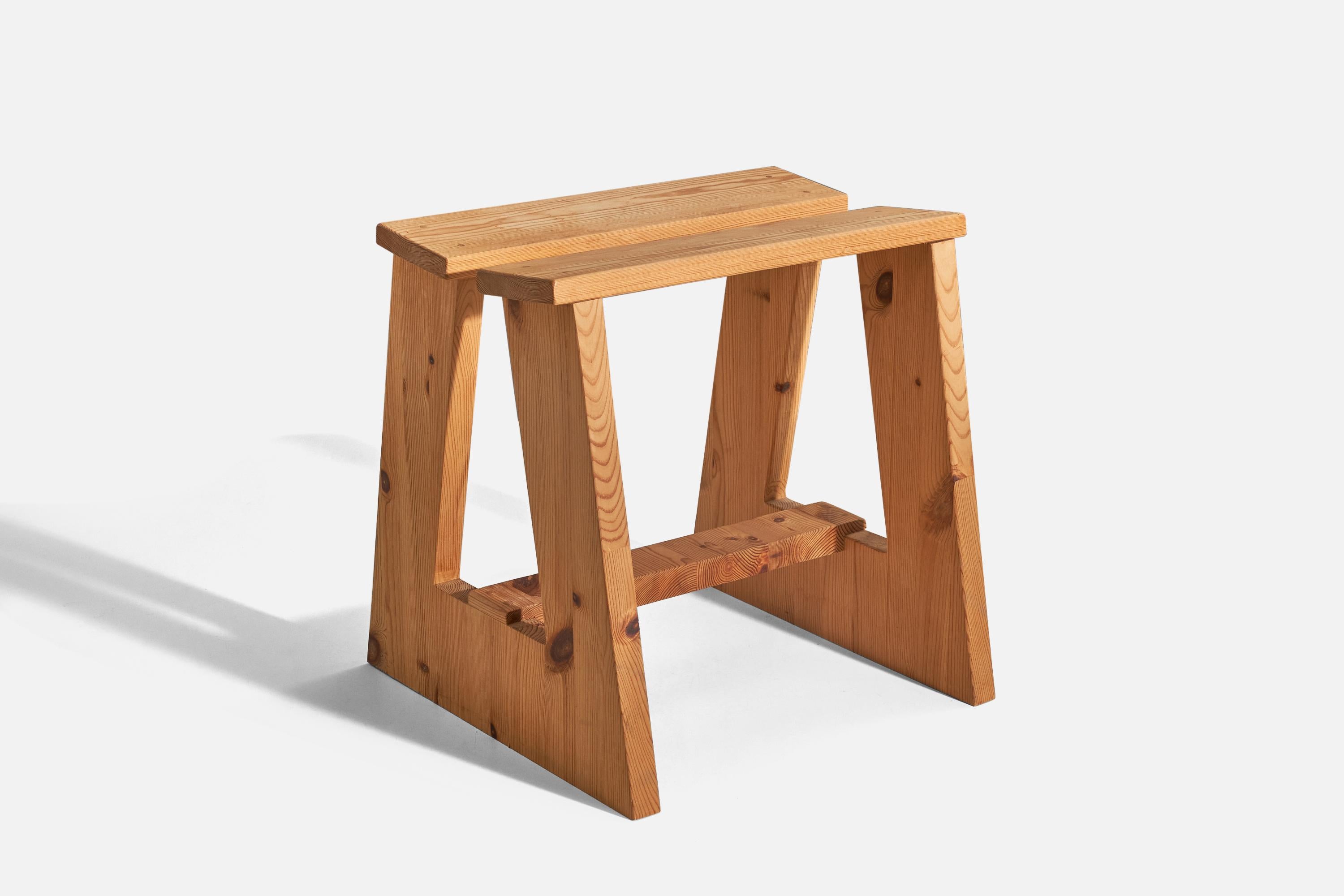 A solid pine wood stool designed and produced in Sweden, c. 1970s.