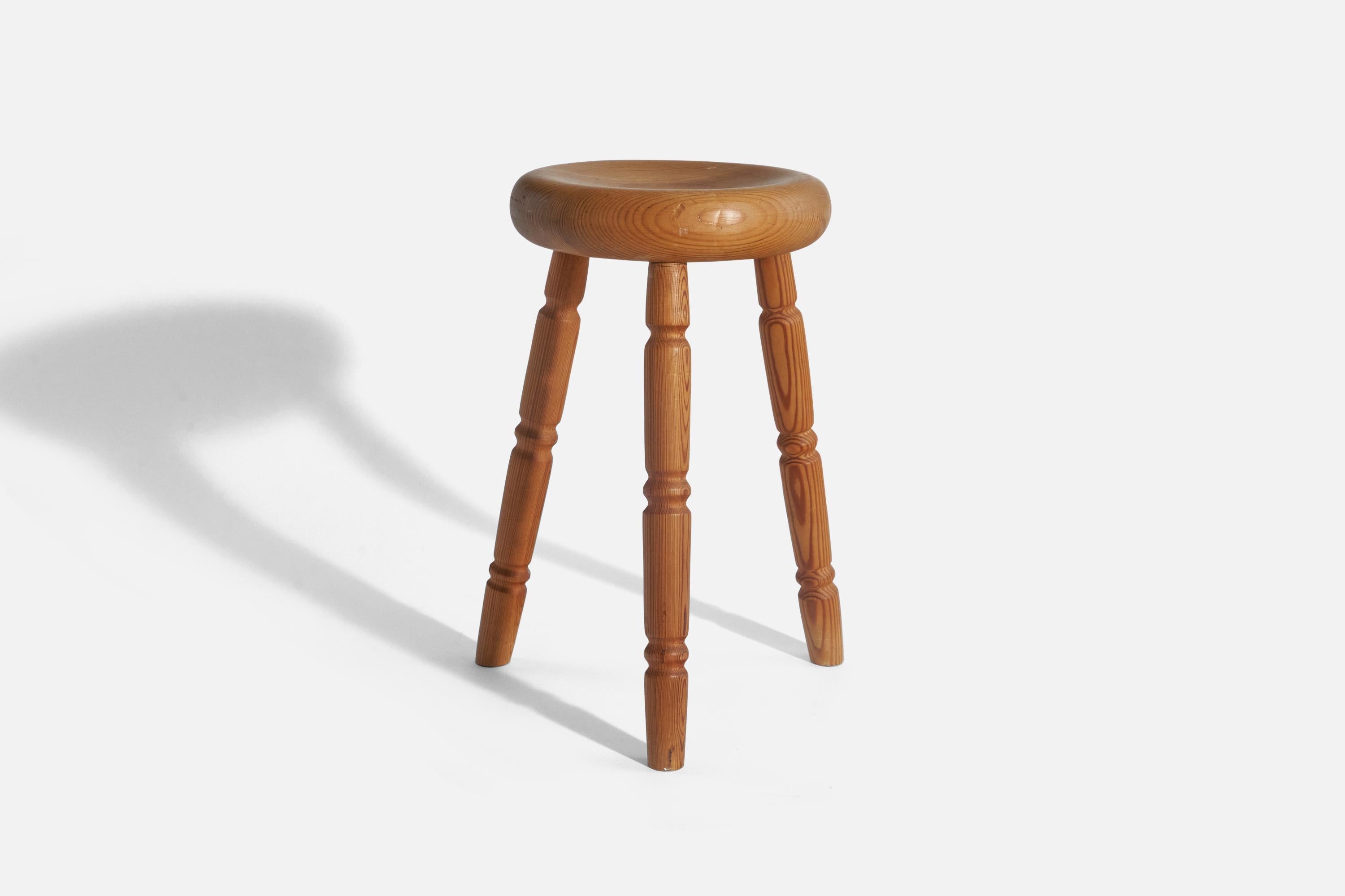 A solid pine stool designed and produced in Sweden, c. 1970s.