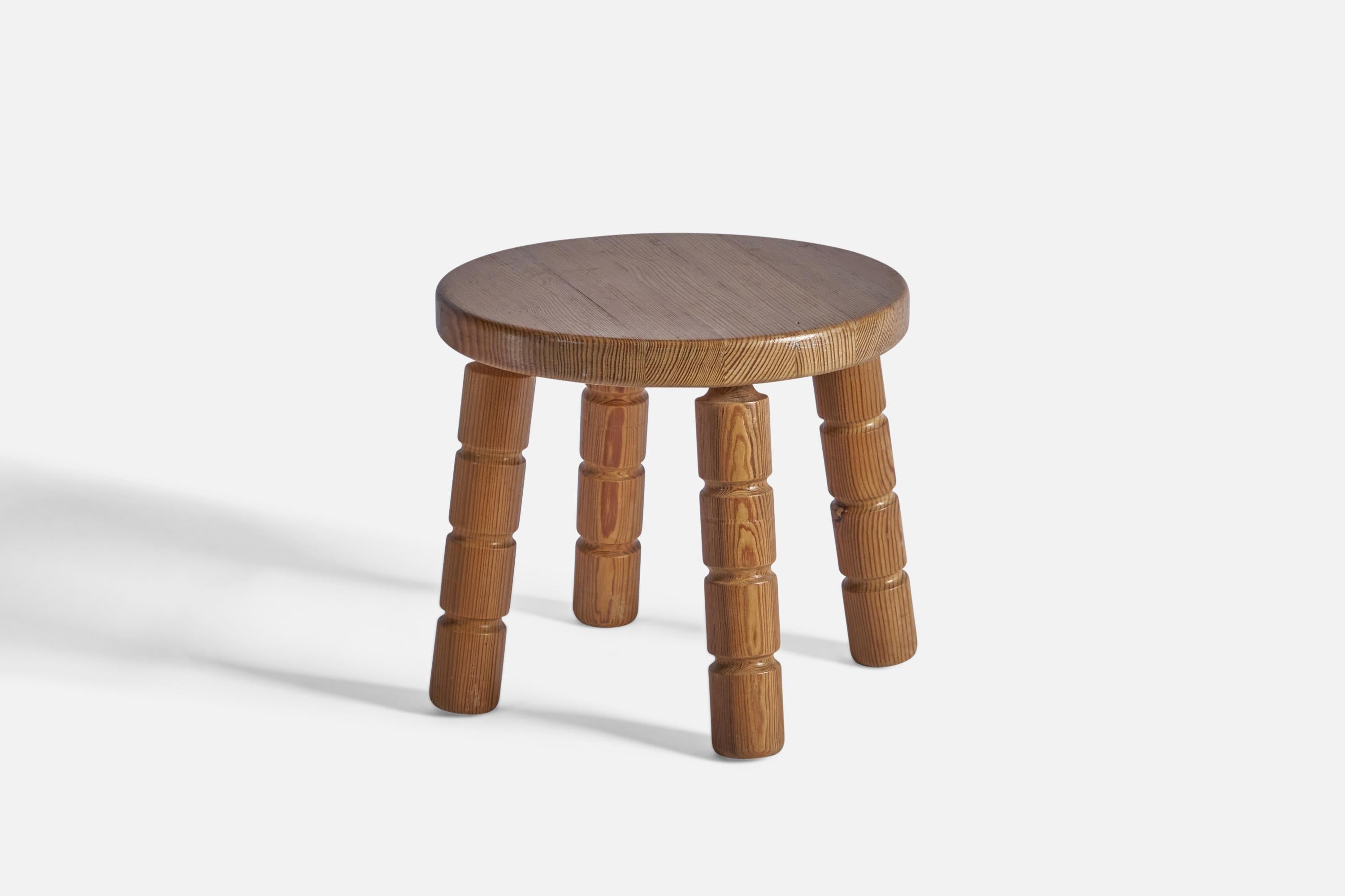 A solid pine stool, designed and produced in Sweden, c. 1970s.