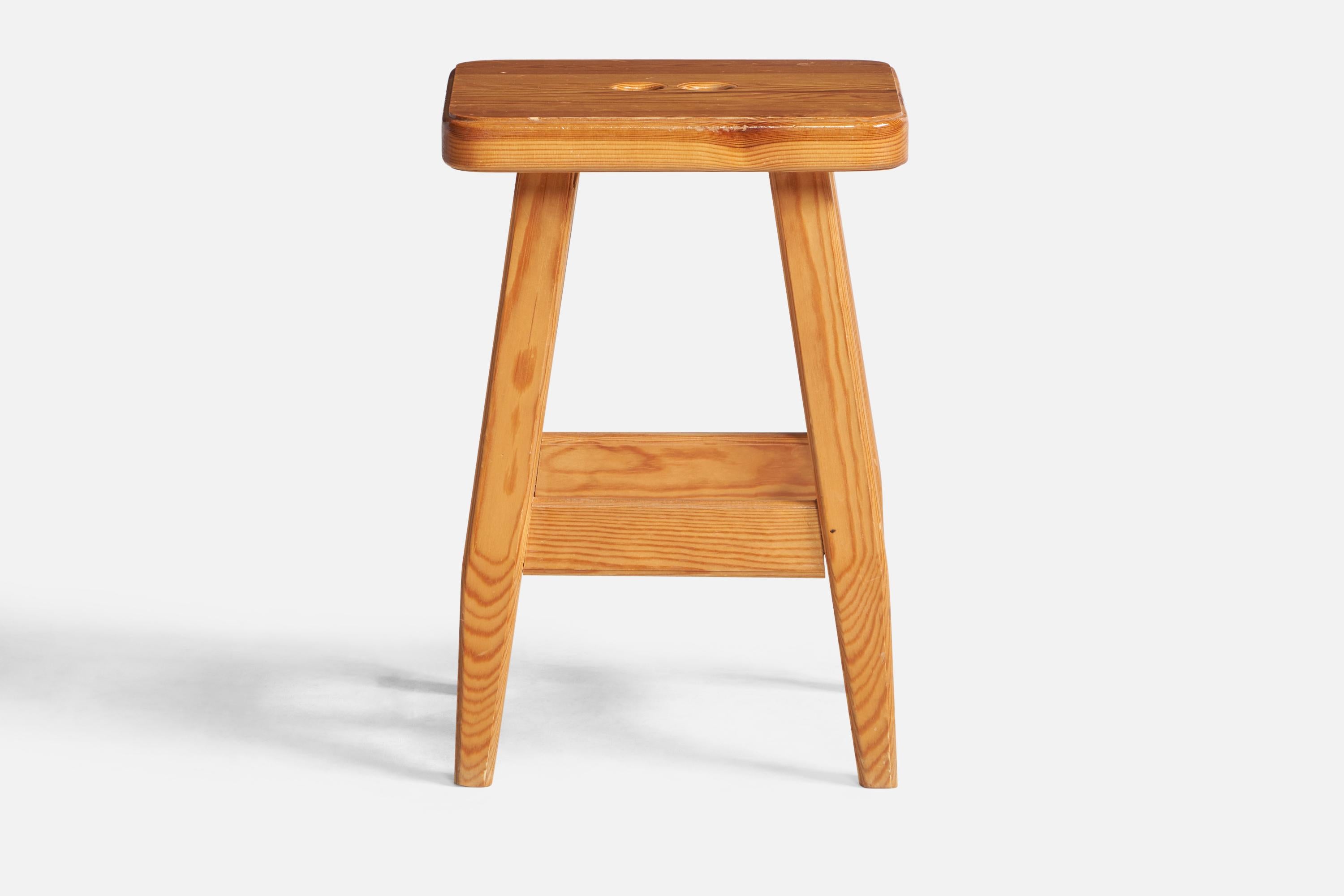 A pine stool designed and produced in Sweden, 1970s.

Seat height: 16.8”