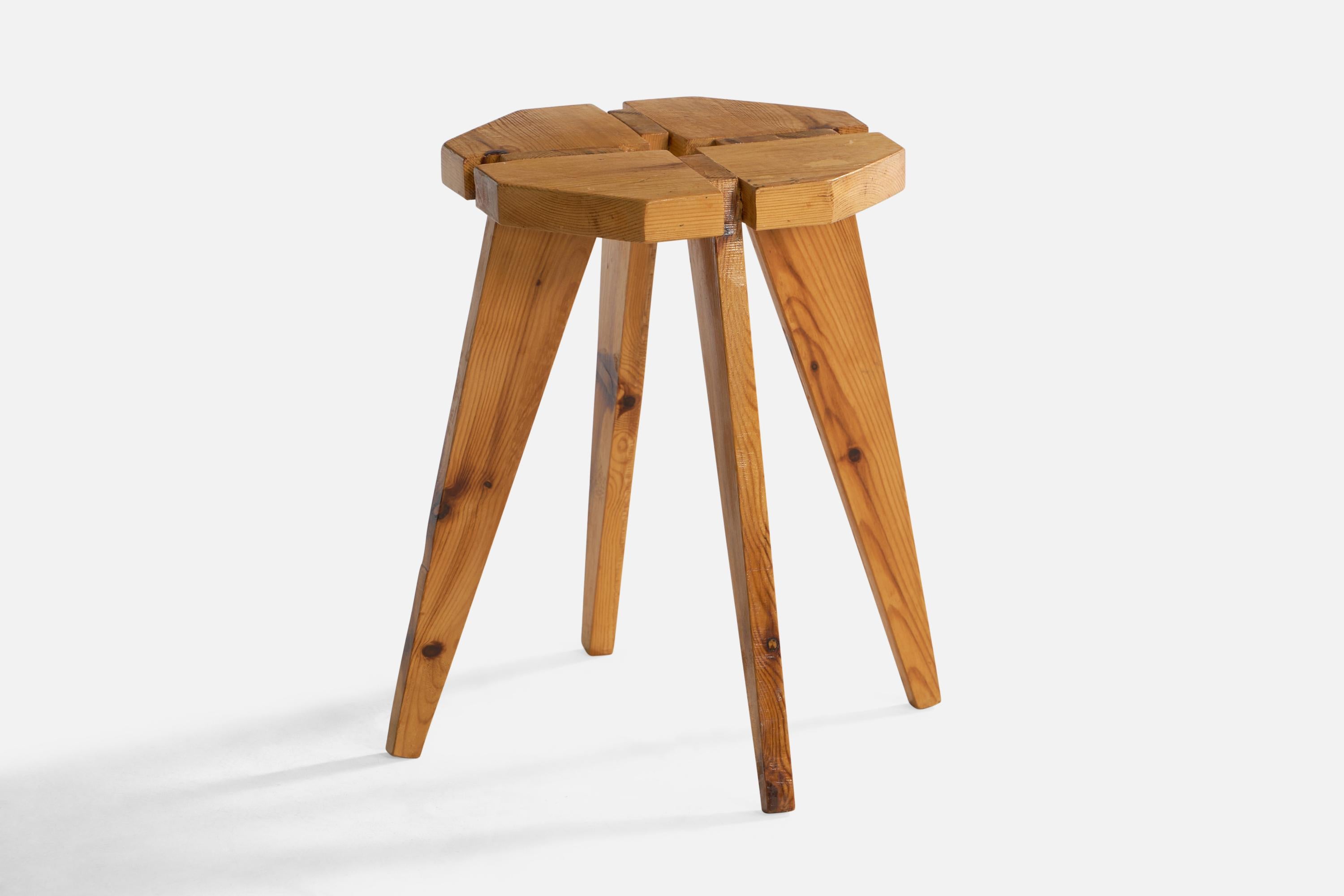 A pine stool designed and produced in Sweden, 1970s.

Seat height: 16.4”