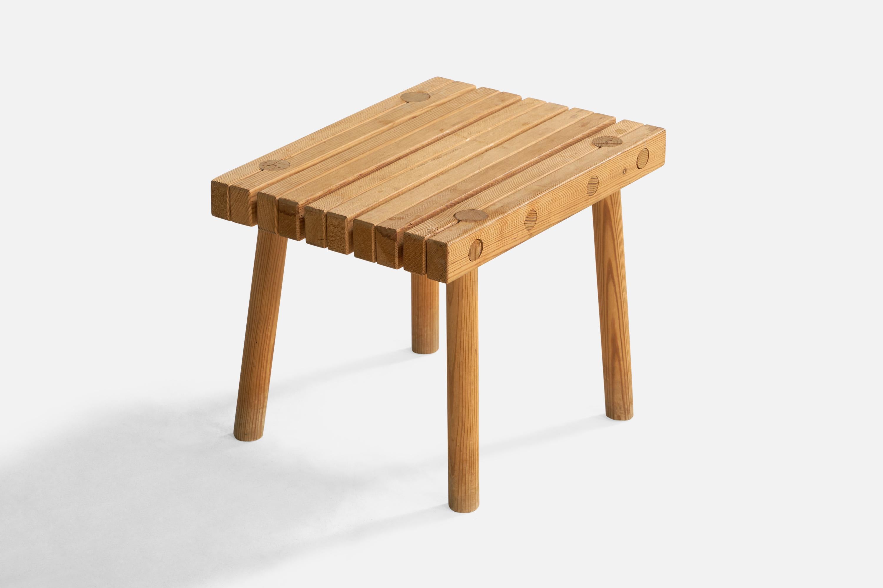 A pine stool or side table designed and produced in Sweden, 1970s.