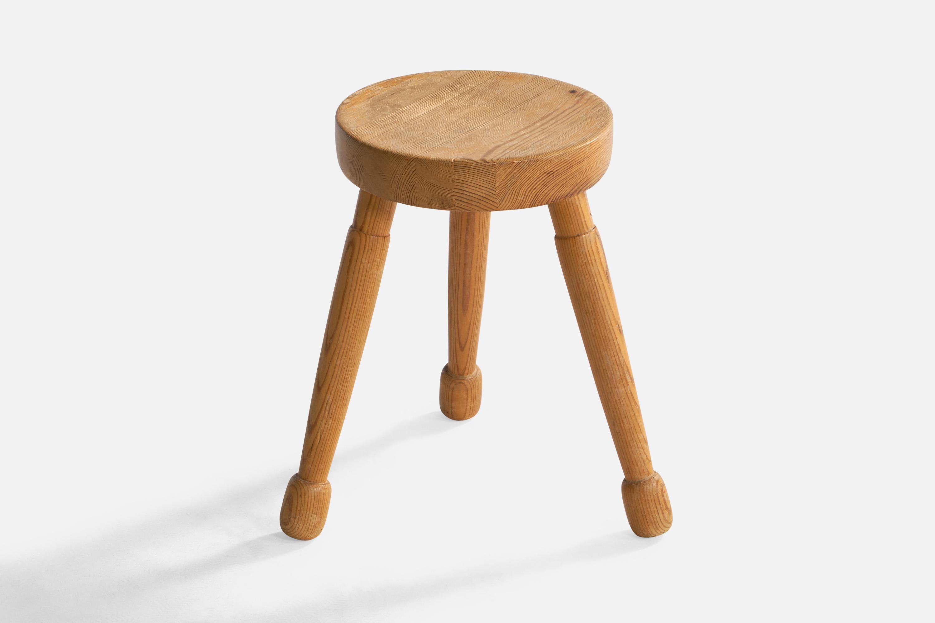 A pine stool designed and produced in Sweden, 1976.

seat height: 16.5”, seat diameter 10.8”