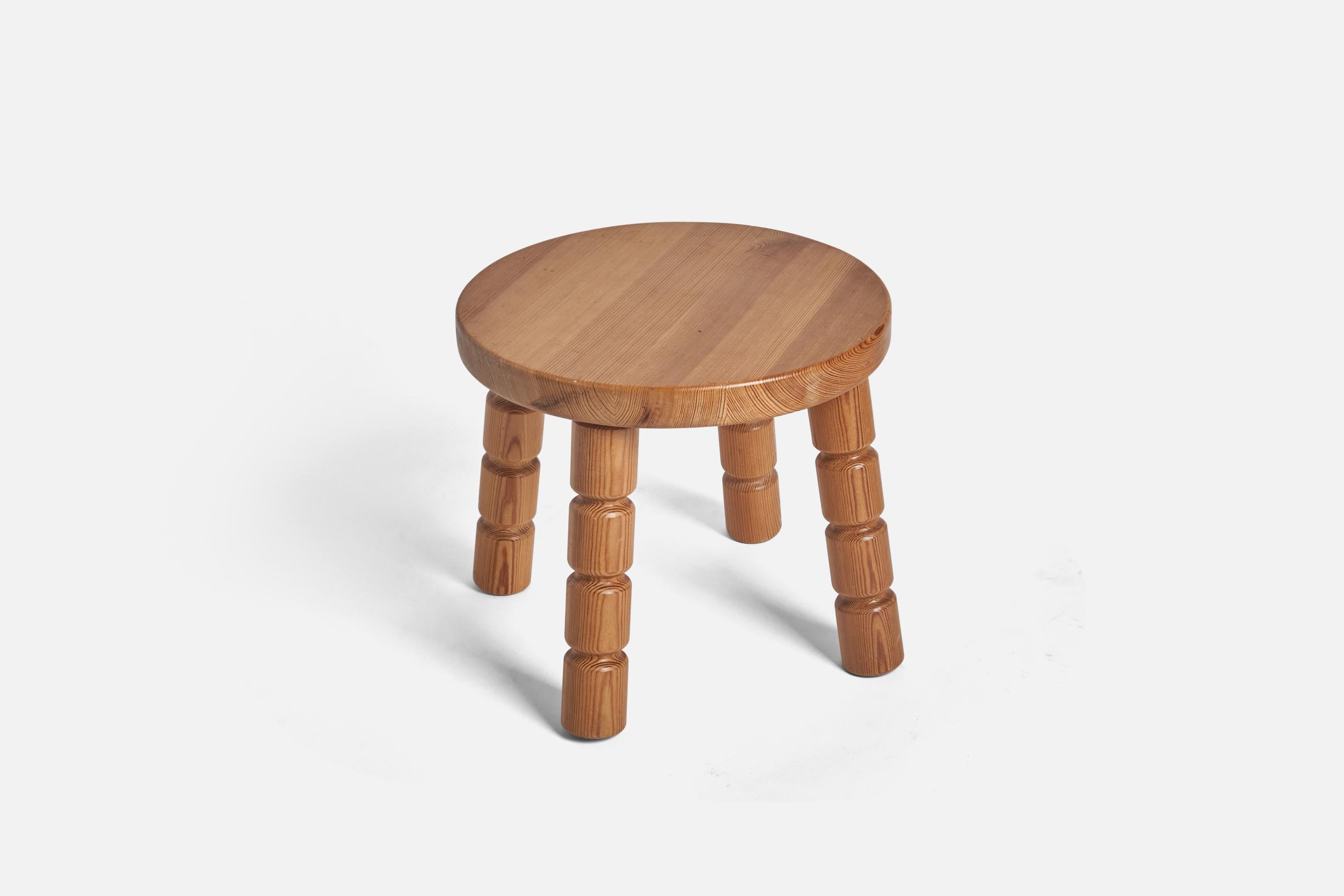 A solid pine stool designed and produced in Sweden, 1970s. 