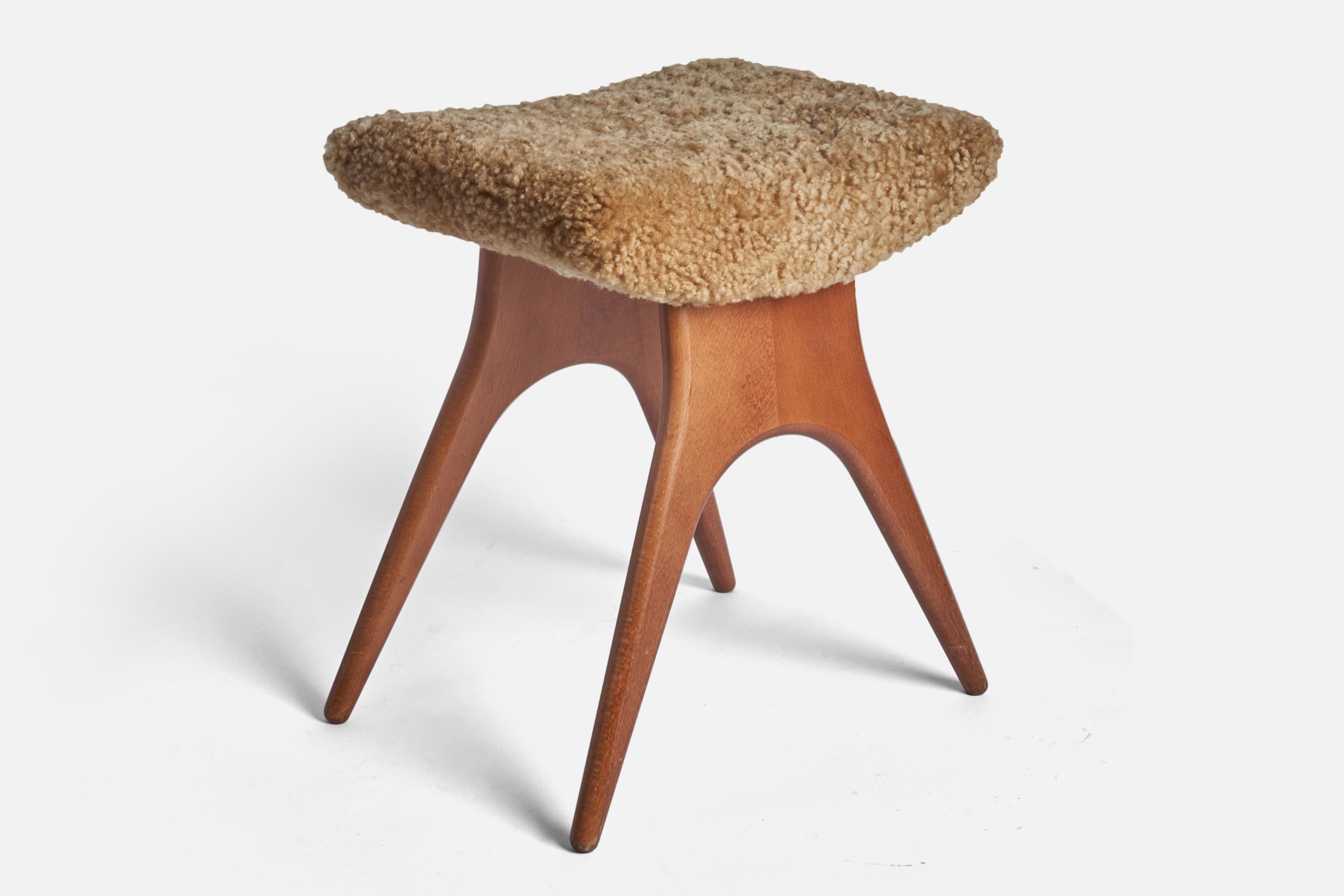 A stool in stained oak, overstuffed seat reupholstered in brand new sheepskin upholstery. Produced in Sweden, 1950s.

Other designers of the period include Finn Juhl, Hans Wegner, Isamu Noguchi, Charlotte Perriand.