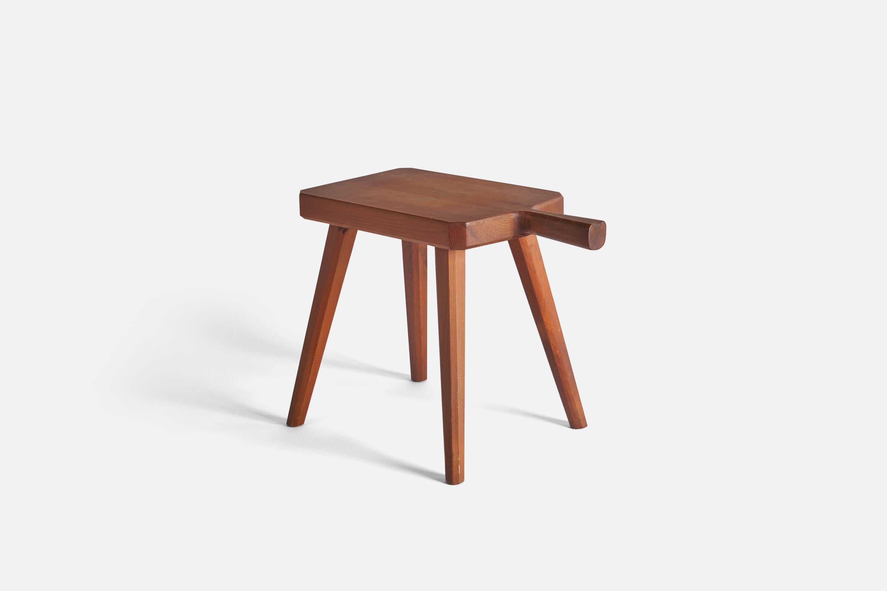 A stained solid pine stool designed and produced in Sweden, 1970s. 