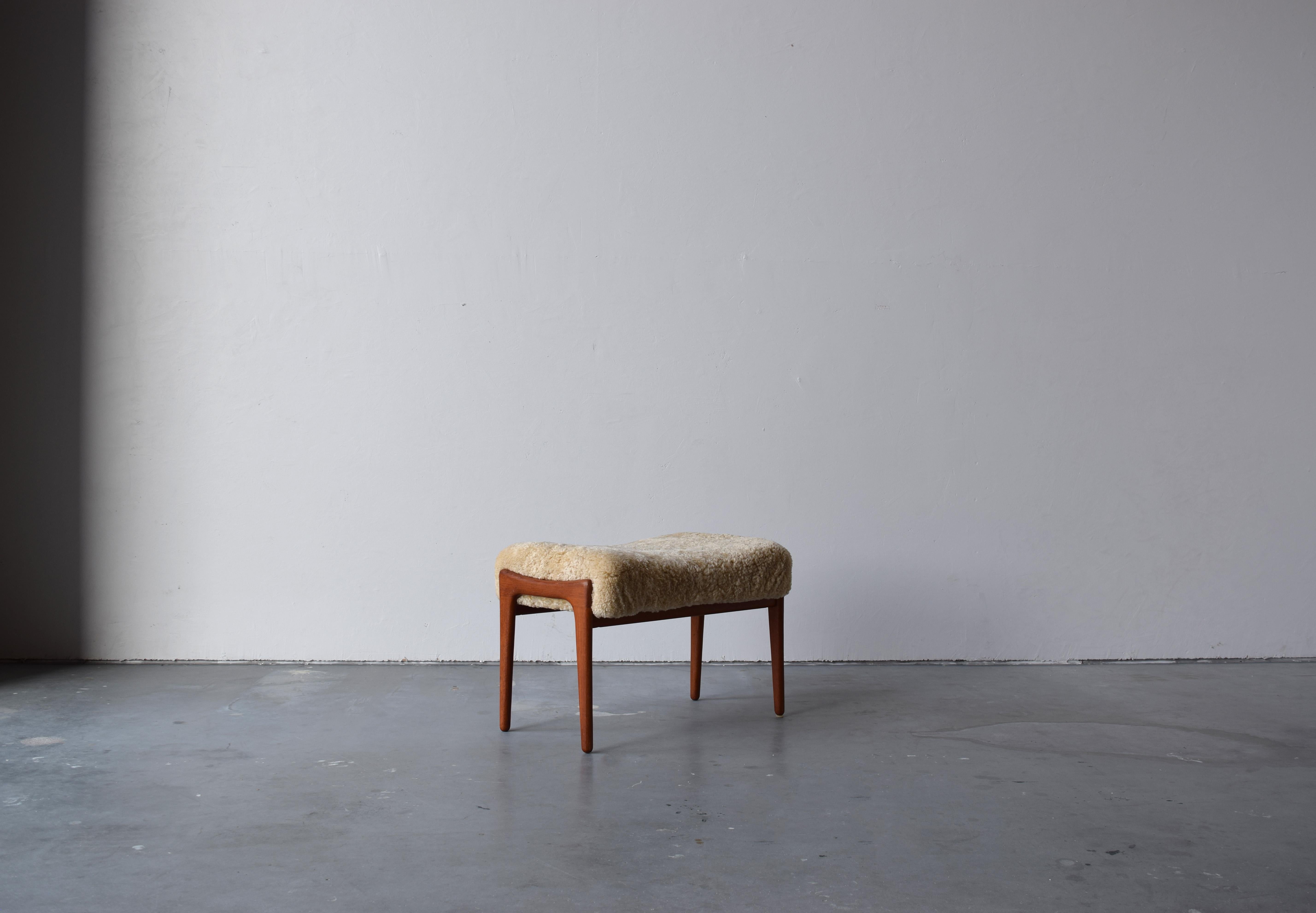 A stool in teak, overstuffed seat reupholstered in brand new sheepskin upholstery. Produced in Sweden, 1950s.

Other designers of the period include Finn Juhl, Hans Wegner, Isamu Noguchi, Charlotte Perriand.