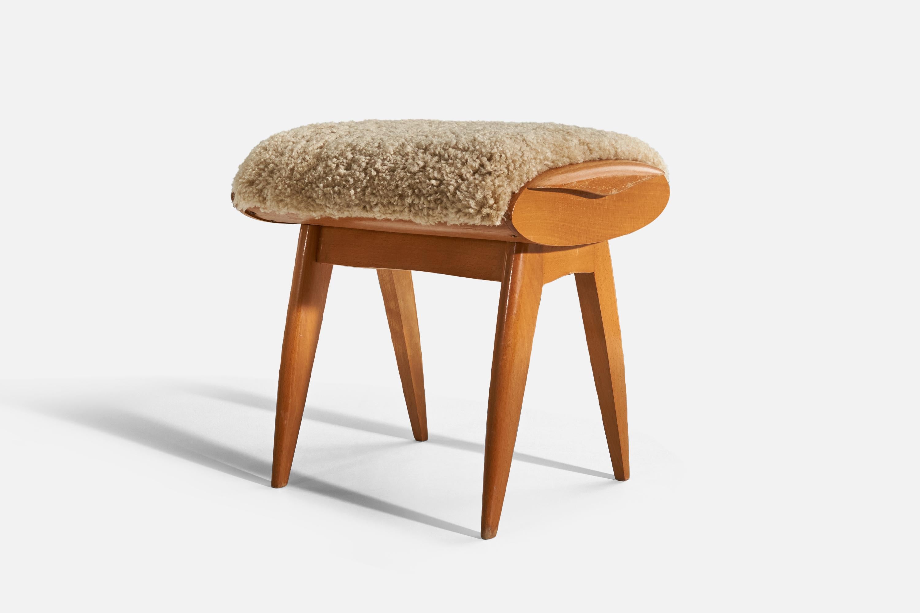 A wood and sheepskin stool designed and produced by a Swedish designer, Sweden, c. 1950s.