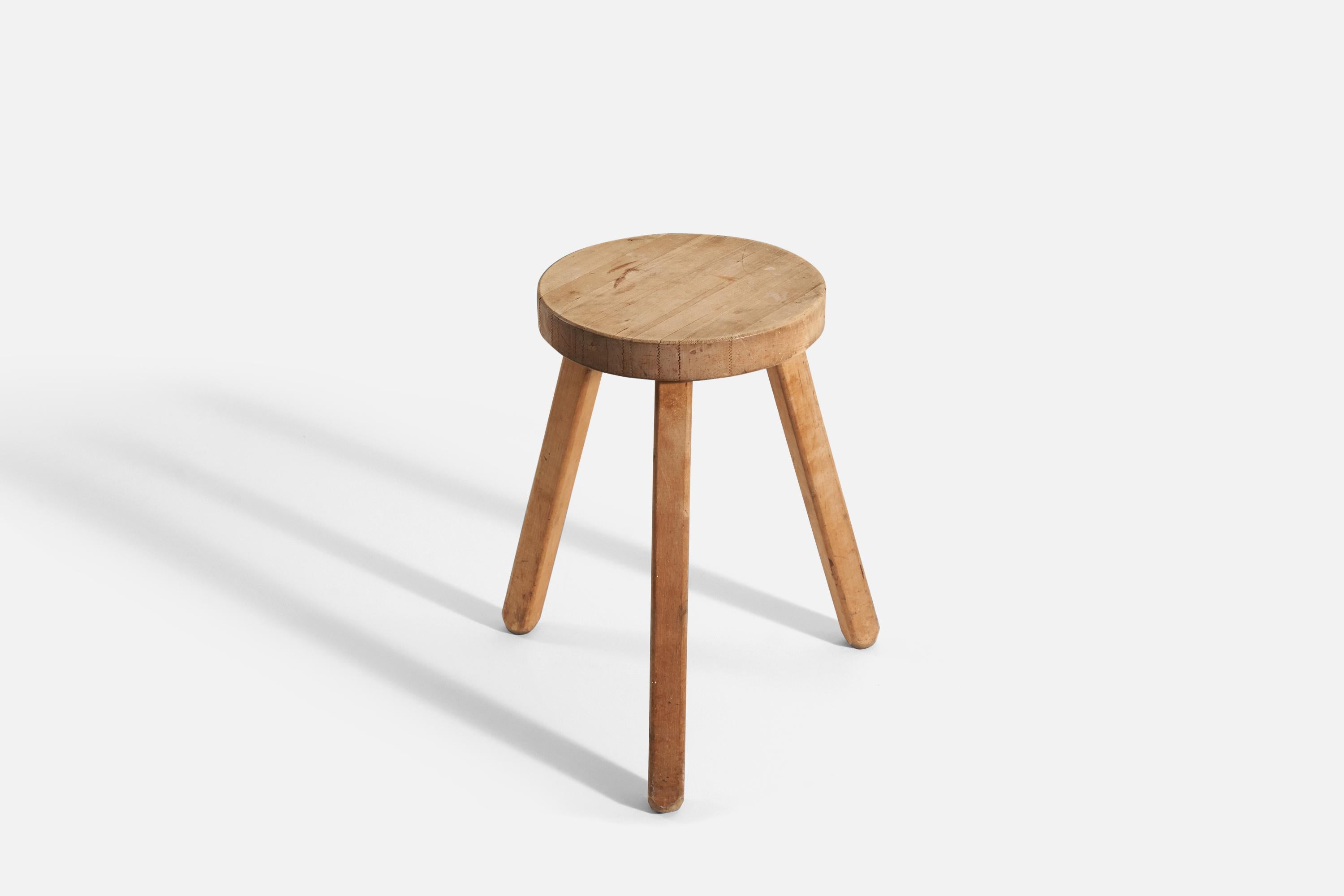 A wood stool, produced by a Swedish designer, Sweden, c. 1950s.