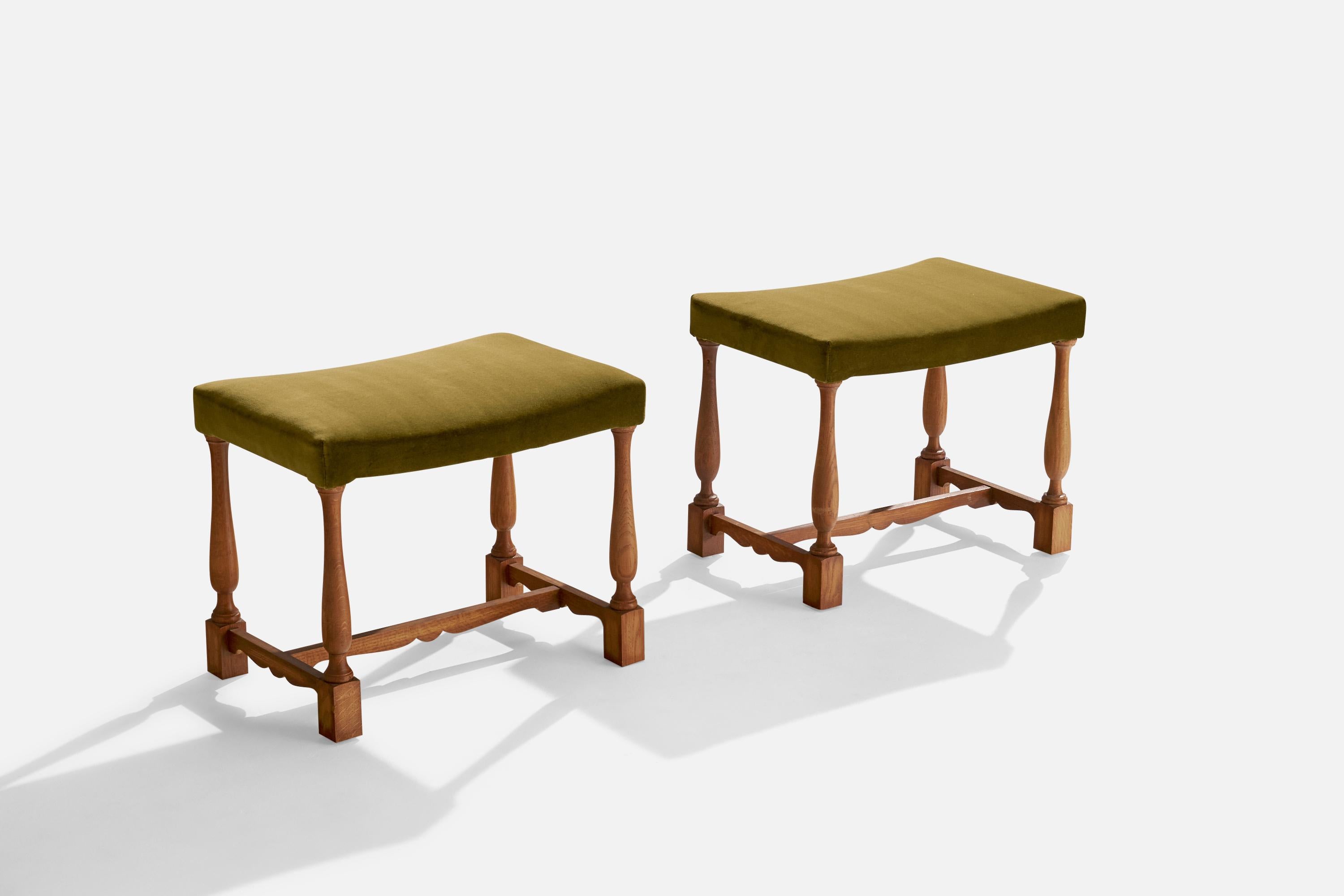 A pair of oak and green velvet stools designed and produced in Sweden, c. 1930s.

Reupholstered in brand new velvet.

Seat height: 17”