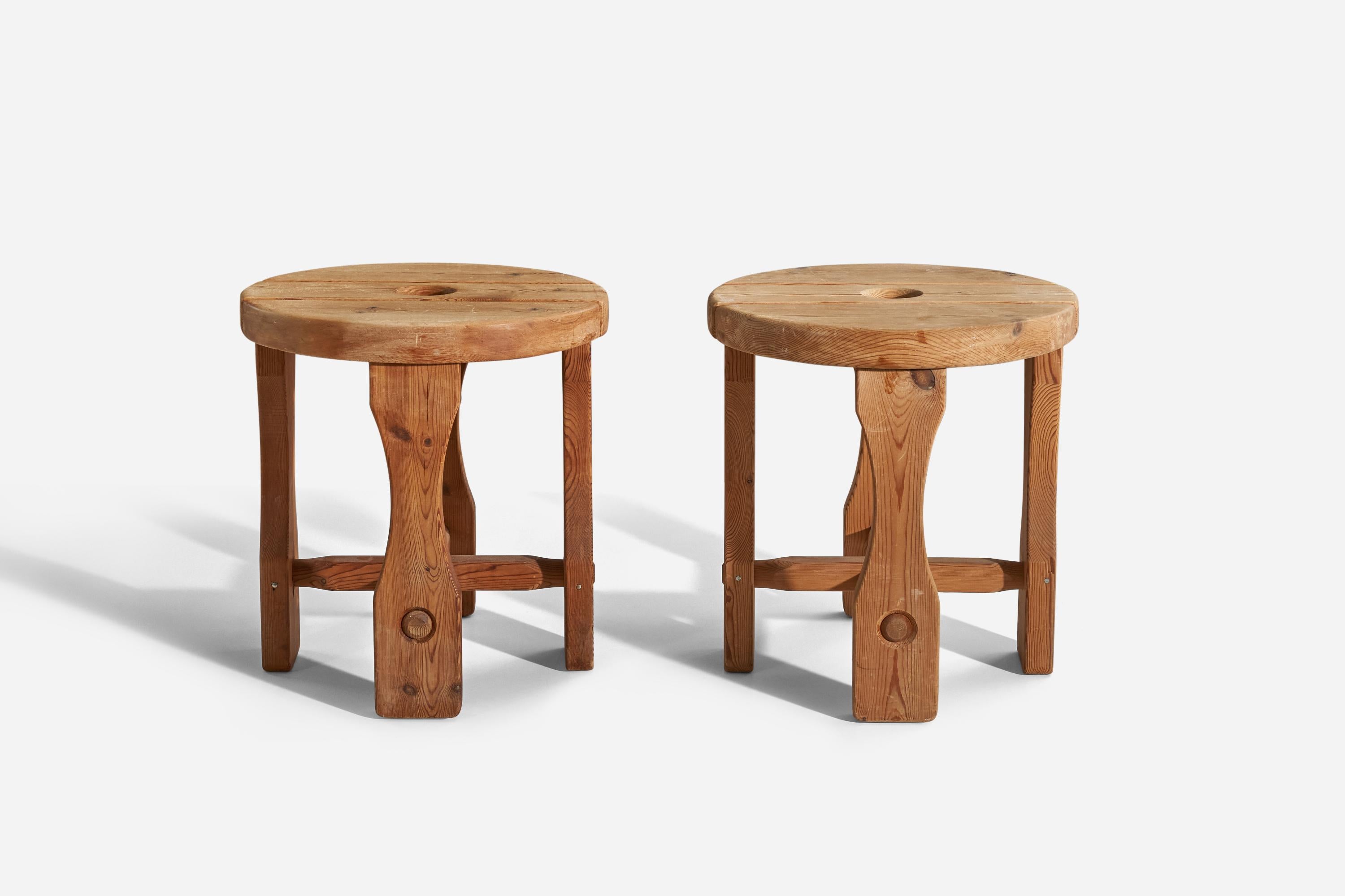 A pair of pine stools designed and produced in Sweden, 1940s.