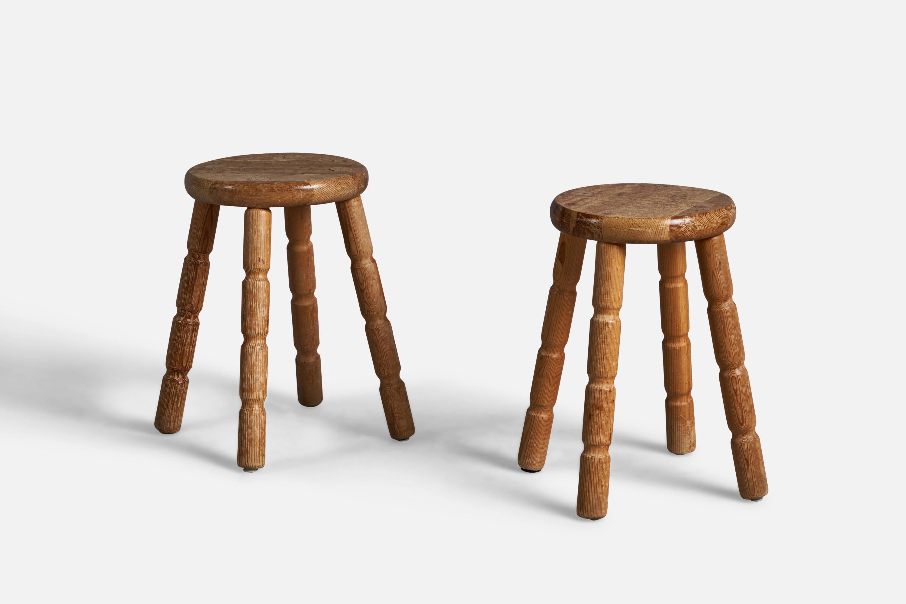 A pair of solid pine stools, designed and produced in Sweden, 1960s.