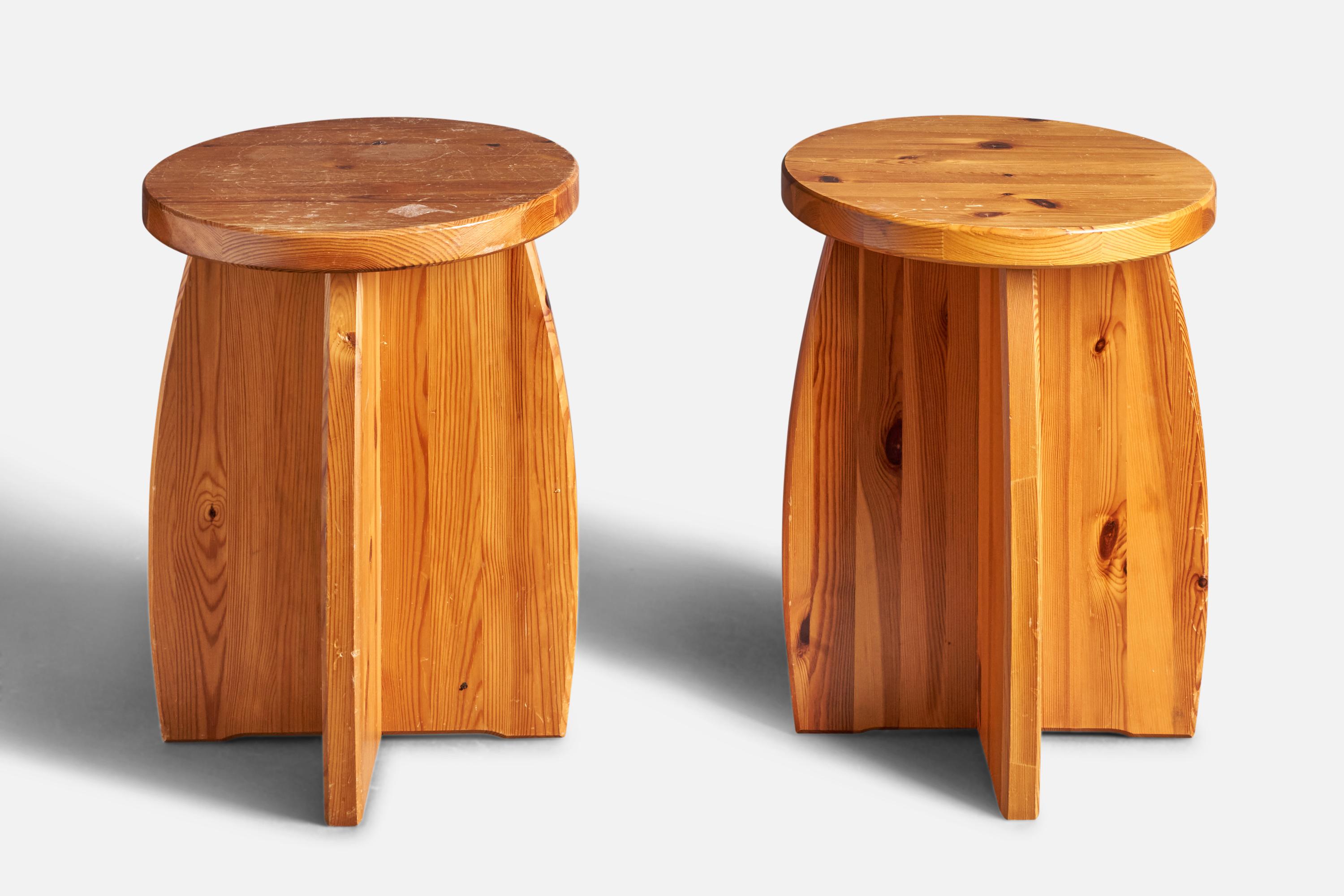 A pair of solid pine stools, designed and produced in Sweden, c. 1970s.
