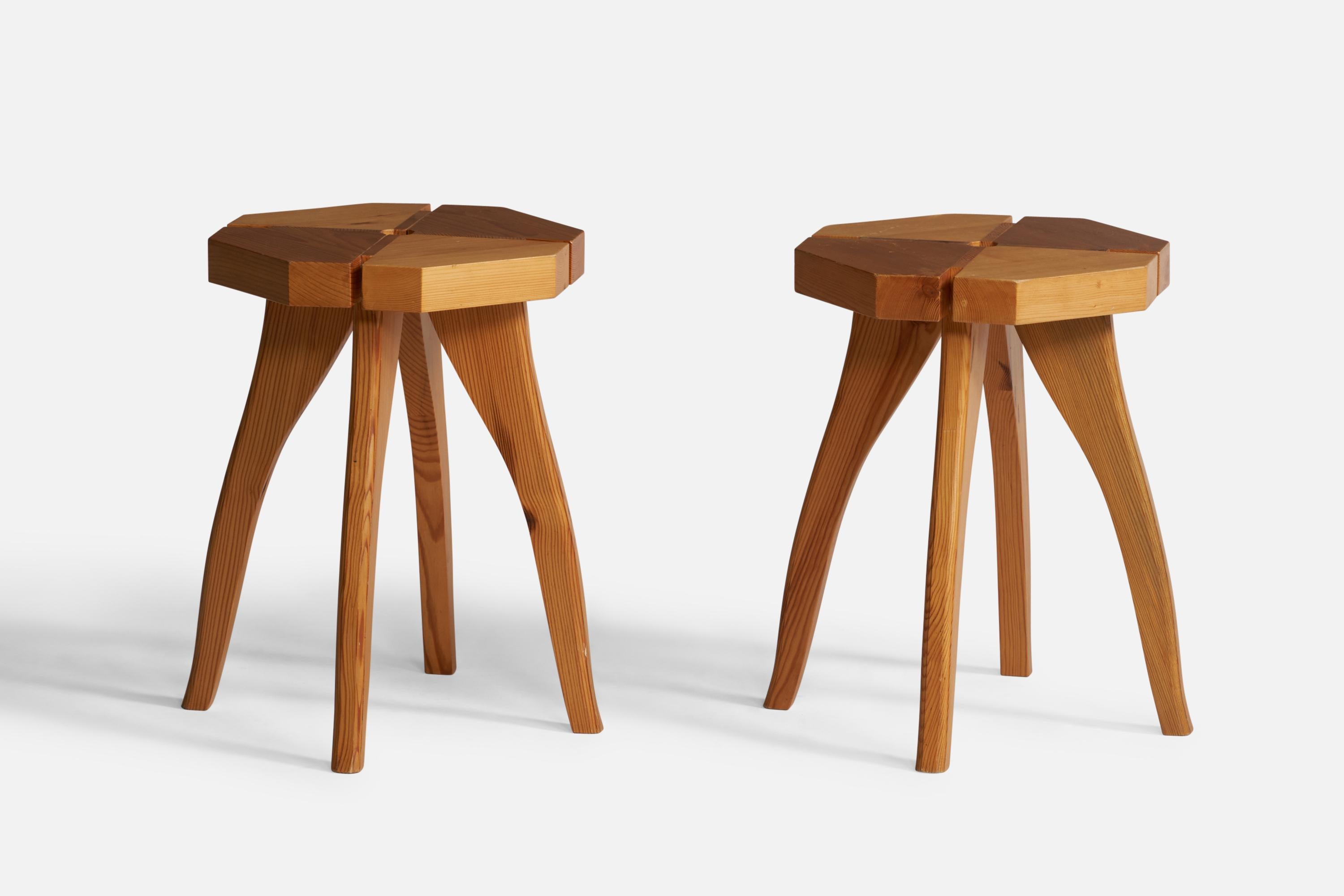 A pair of pine stools designed and produced in Sweden, c. 1970s.

Seat height: 17”
seat width and depth: 12”