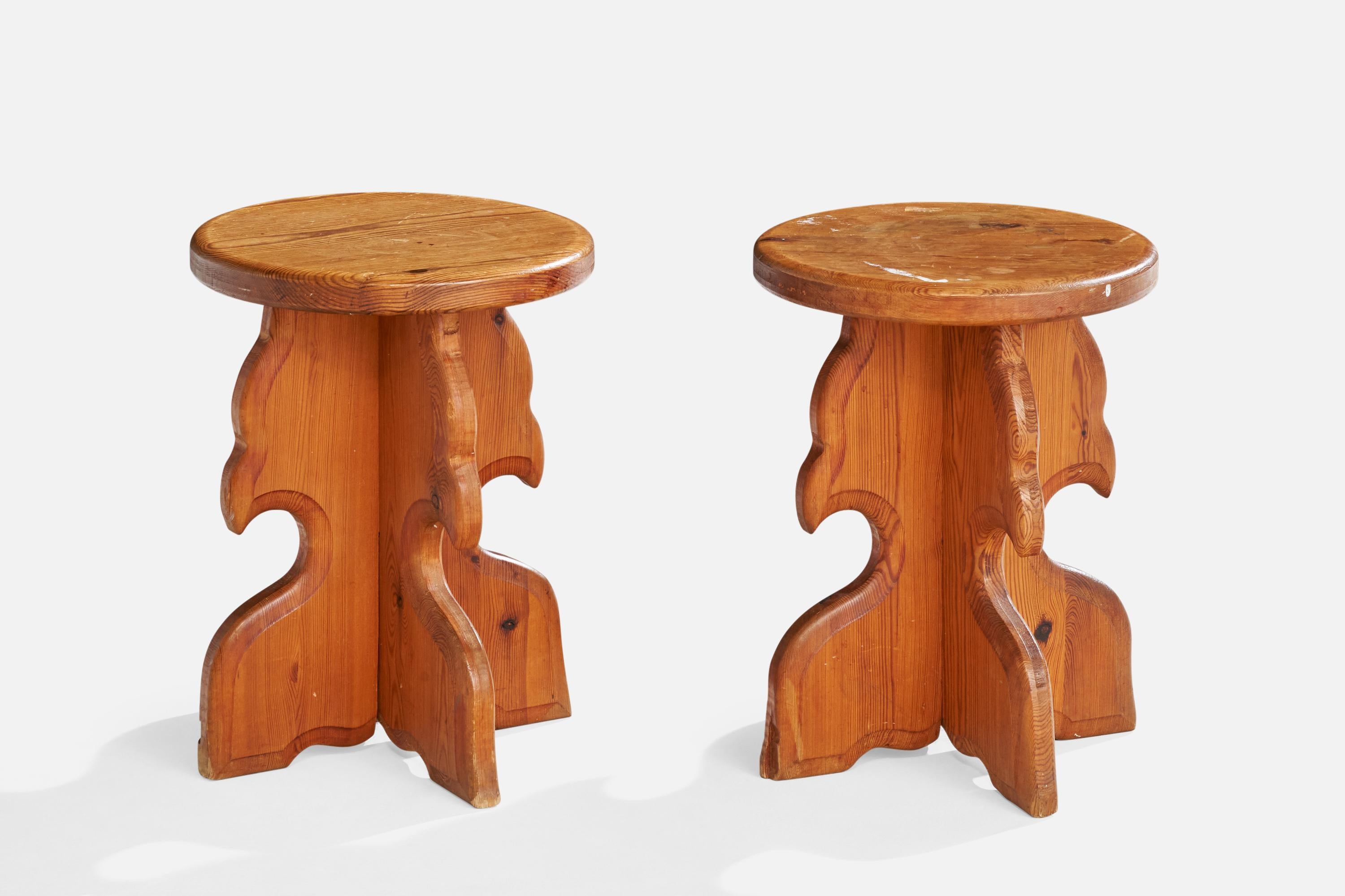 A pair of pine stools designed and produced n Sweden, c. 1970s

Discoloration and scratching, paint remnants present. 

Dimensions: 17.75” H x 13.25” Diameter