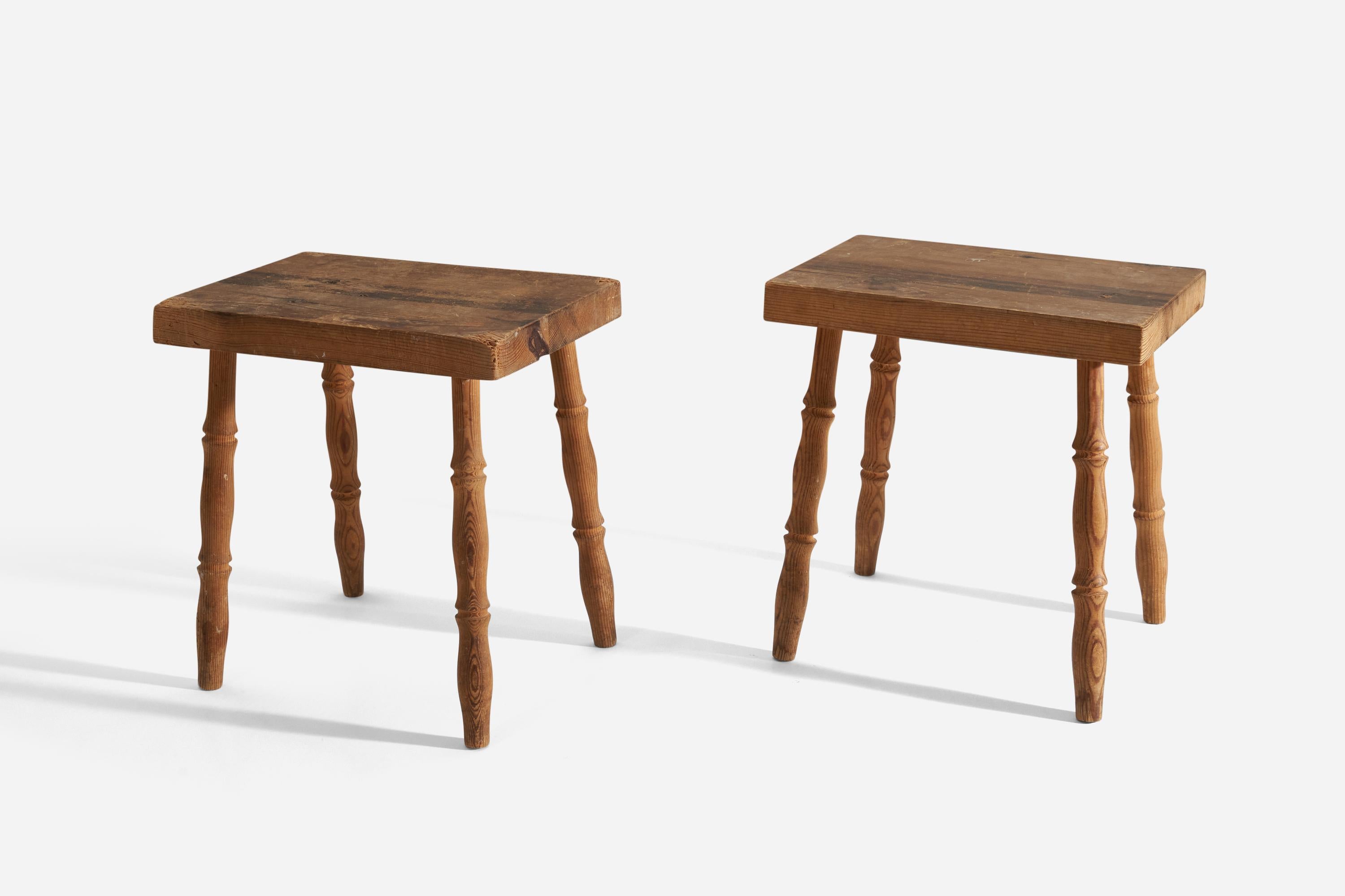 A pair of solid pine stools, designed and produced in Sweden, 1940s.