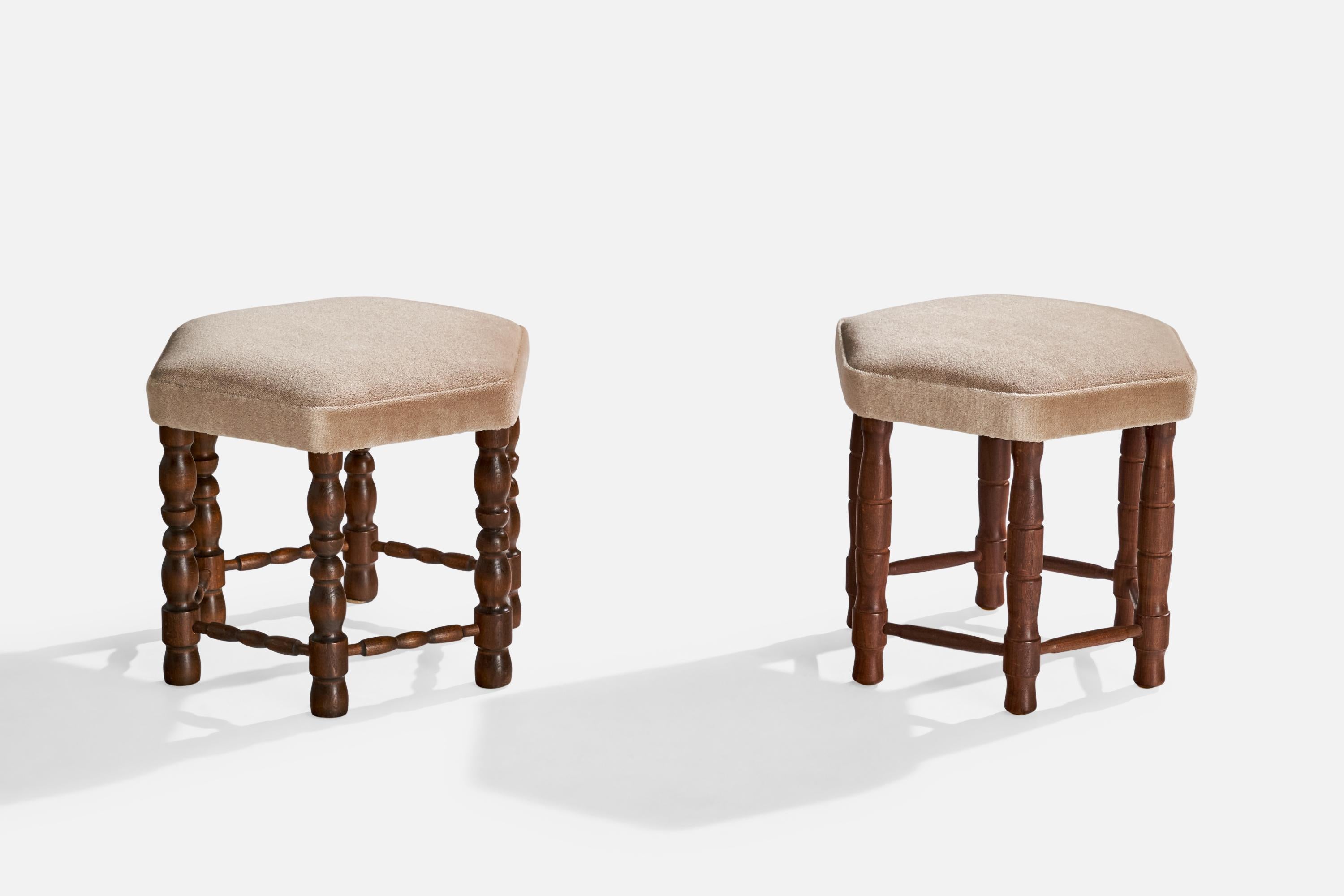 A pair of dark-stained wood and grey mohair stools designed and produced in Sweden, c. 1920s.

Dimensions: 13.25” H x 16.25” W x 14.75” D