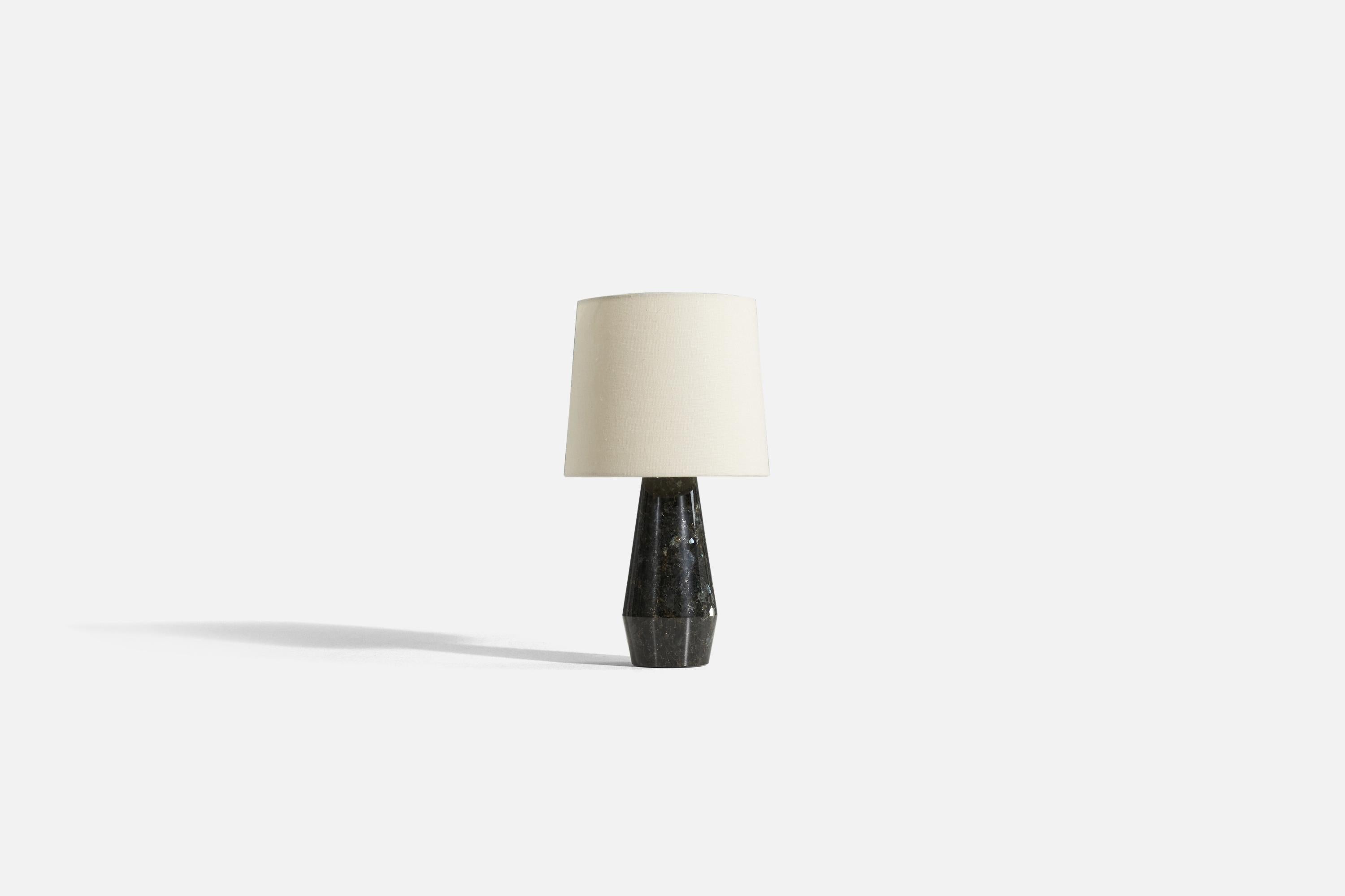 A belgian black marble table lamp produced by a Swedish designer, Sweden, 1960s.

Sold without lampshade. 

Dimensions of lamp (inches) : 11.125 x 3.875 x 3.875 (H x W x D)
Dimensions shade (inches) : 7 x 8 x 7 (T x B x H)
Dimension of lamp