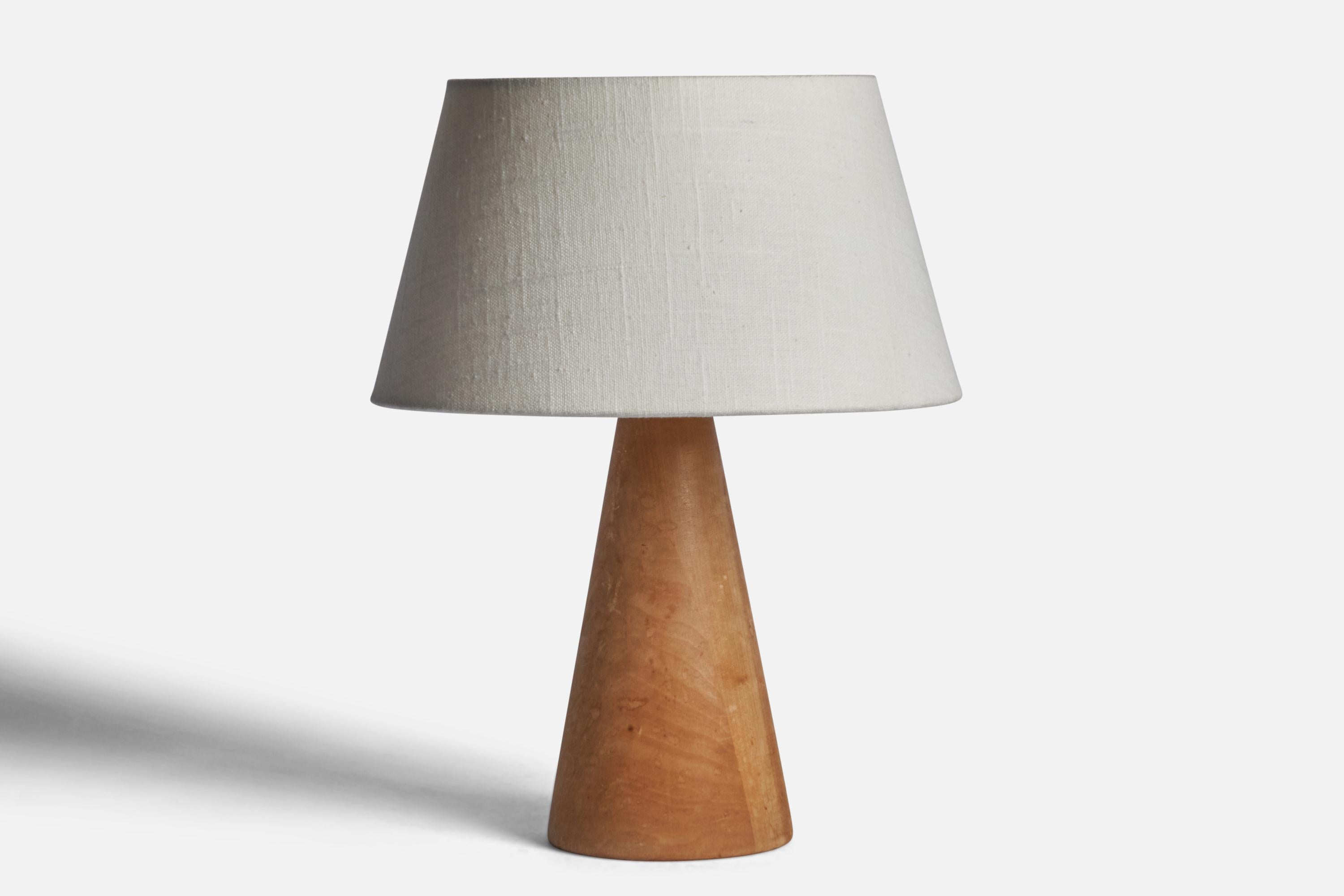 A birch table lamp designed and produced in Sweden, 1950s.

Dimensions of Lamp (inches): 10.25” H x 4.20” Diameter
Dimensions of Shade (inches): 7” Top Diameter x 10” Bottom Diameter x 5.5” H 
Dimensions of Lamp with Shade (inches): 13.15” H x