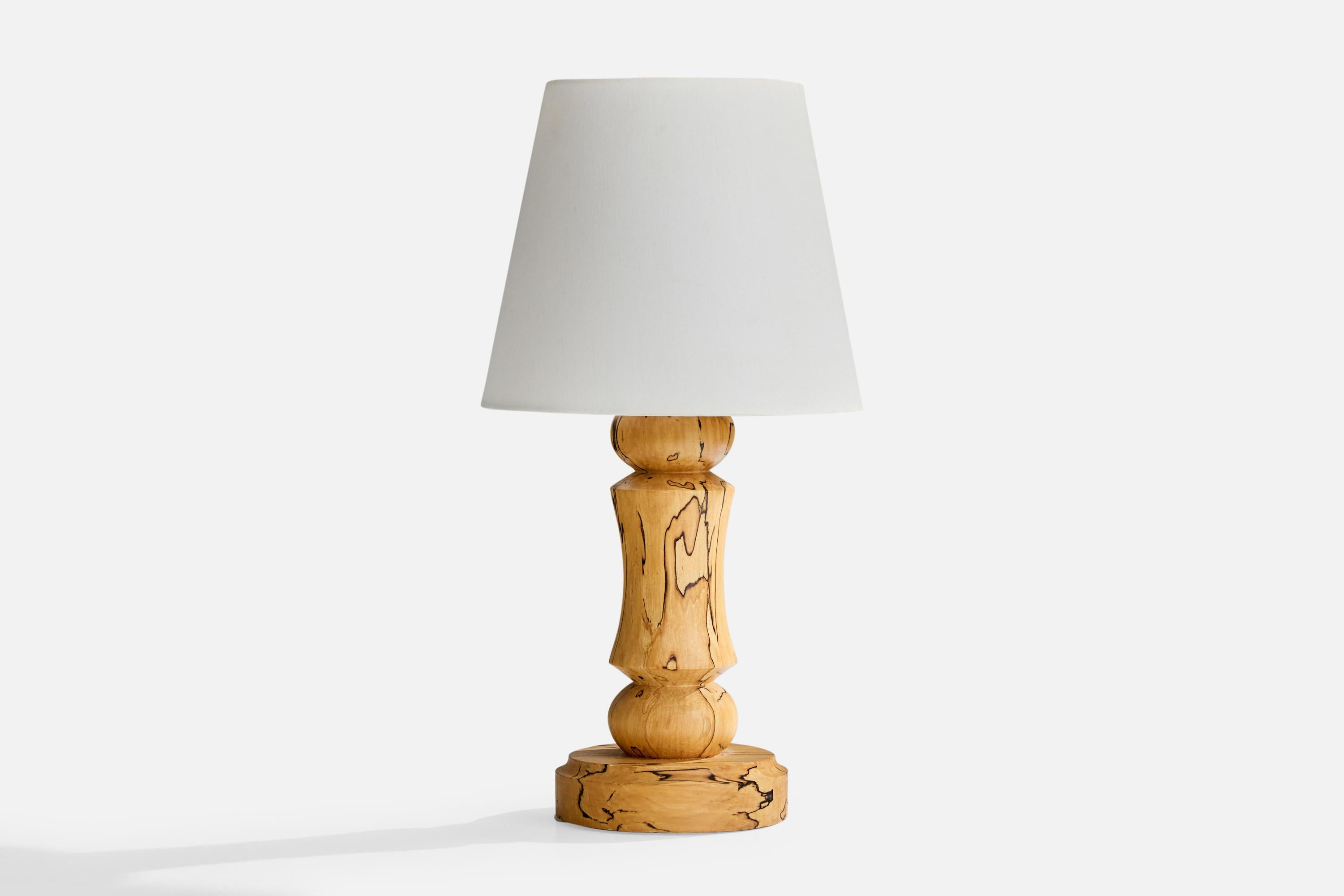A masur-birch table lamp designed and produced in Sweden, c. 1970s.

Dimensions of Shade (inches): 5” Top Diameter x 8” Bottom Diameter x 6.75” Height

Dimensions of Lamp with Shade (inches): 15.5” Height x 8” Diameter

Overall Dimensions (inches):