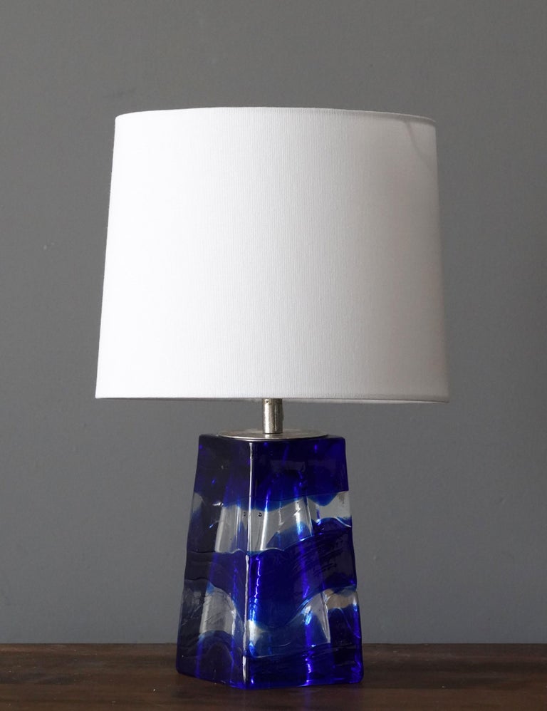 A table lamp. Base in glass.

Sold without lampshade. Stated dimensions excluding lampshade.

Other designers of the period include Paavo Tynell, Lisa Johansson-Pape, Hans Bergström.

