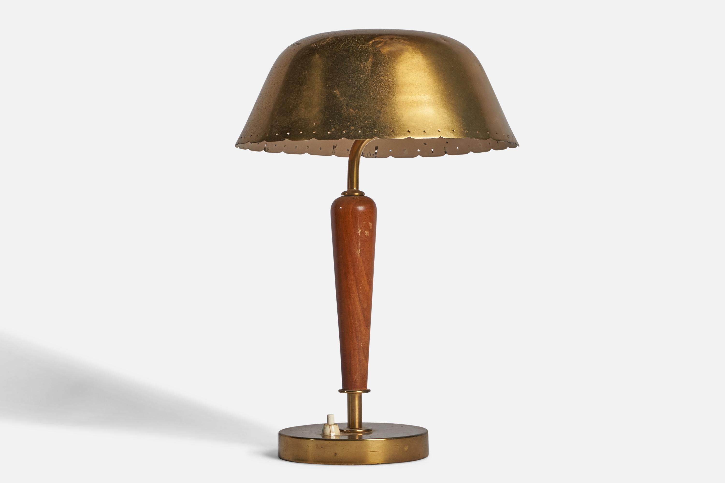 A brass and stained elm table lamp designed and produced in Sweden, 1930s.

Overall Dimensions (inches): 14.25” H x 9.25” Diameter
Bulb Specifications: E-26 Bulb
Number of Sockets: 1
All lighting will be converted for US usage. We are unable to