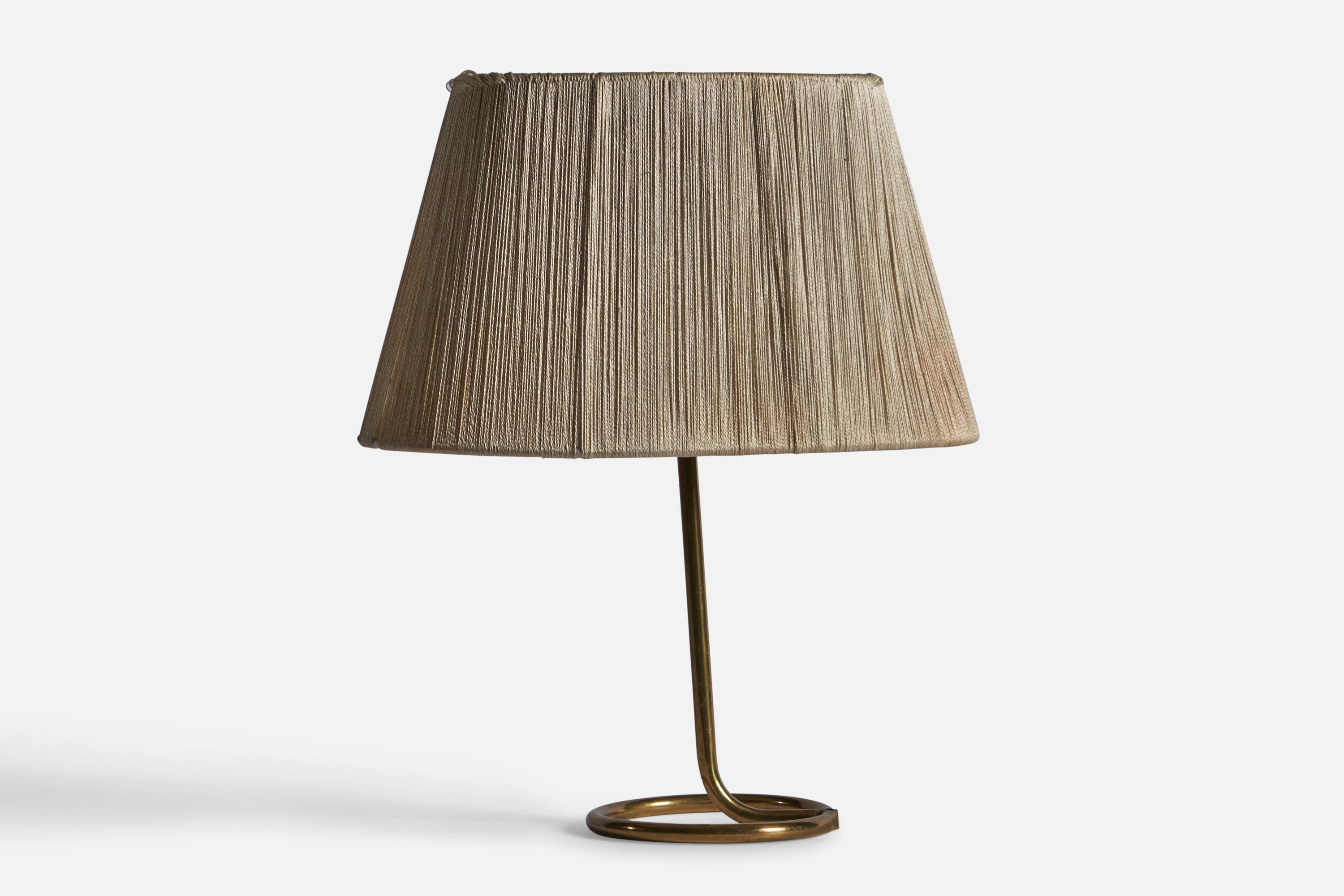 A brass and fabric string table lamp, designed and produced in Sweden, c. 1950s.

Overall Dimensions: 14.4