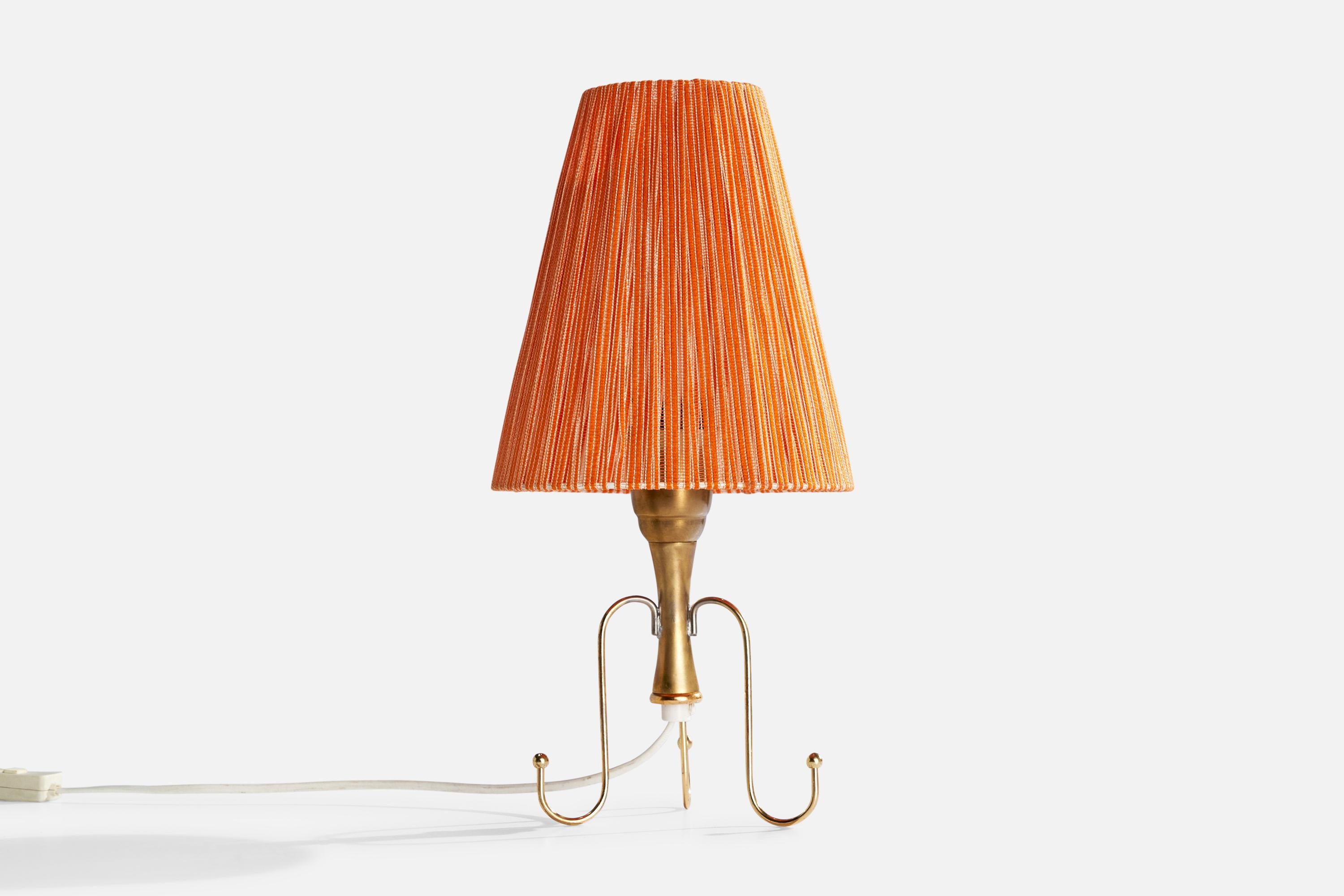 A brass and orange fabric table lamp designed and produced in Sweden, c. 1950s.

Dimensions of Lamp with Shade (inches): 14.875“ H x 7.375” Diameter

Bulb Specifications: E-26 

Number of Sockets (per fixture): 1

Sold with lampshade.

All lighting