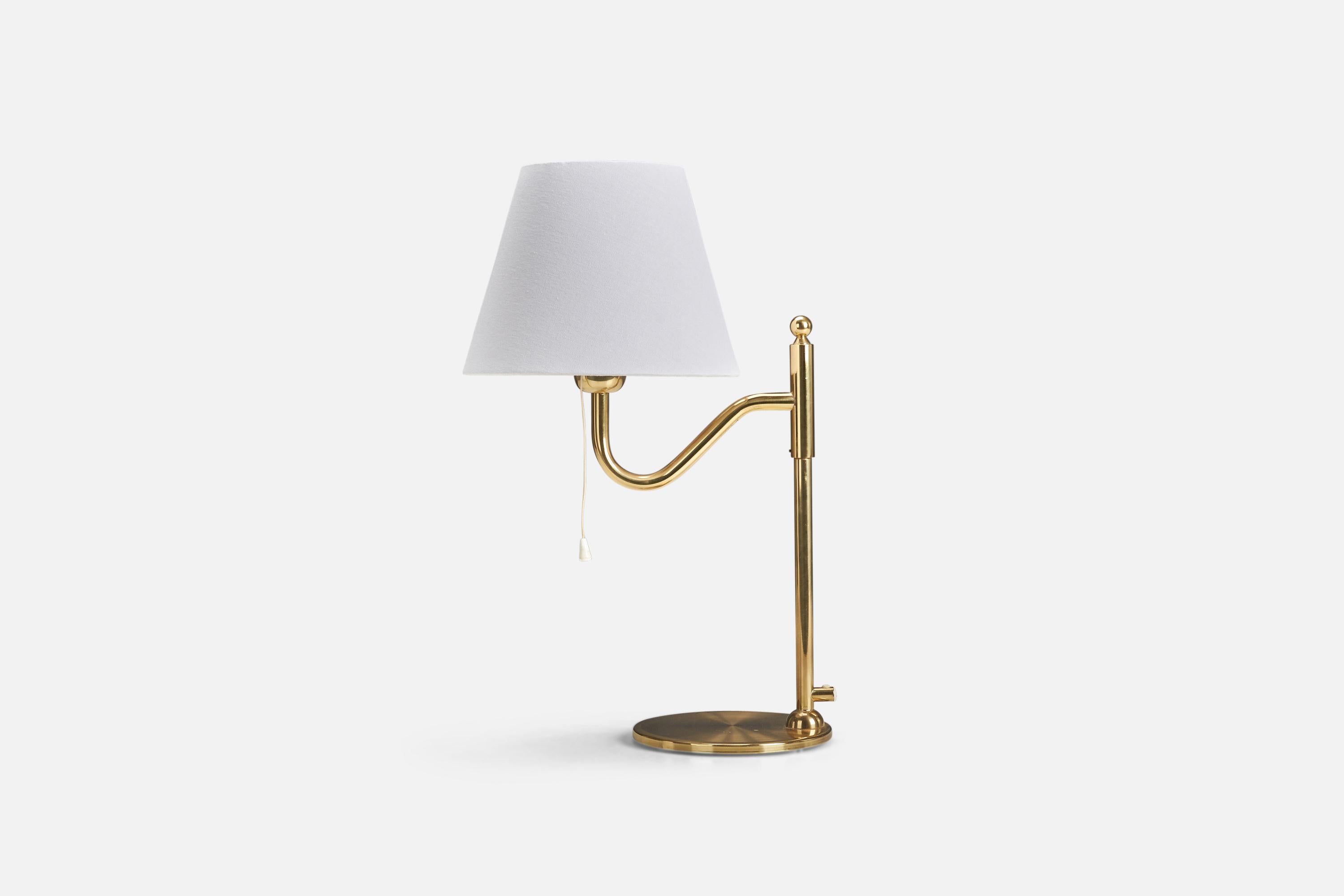 A brass and fabric table lamp designed and produced by a Swedish Designer, Sweden, 1970s.

Dimensions of Lamp (inches) : 14.87 x 6.9 x 9.62 (Height x Width x Depth)
Dimensions of Lampshade (inches) : 5.5 x 9.5 x 7.5 (Top Diameter x Bottom