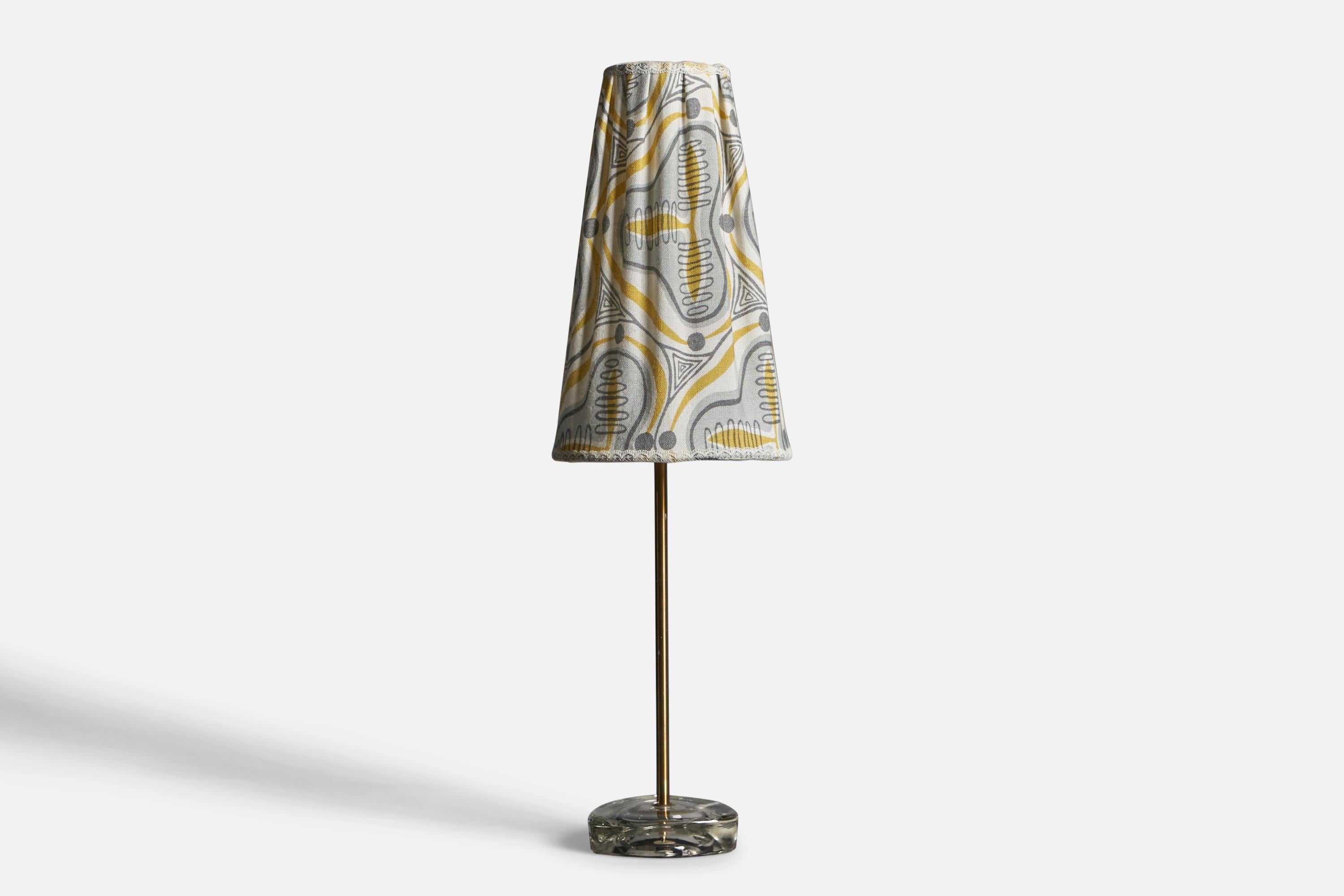 A brass, glass and printed fabric table lamp, designed and produced in Sweden, 1950s.
Overall Dimensions (inches): 22