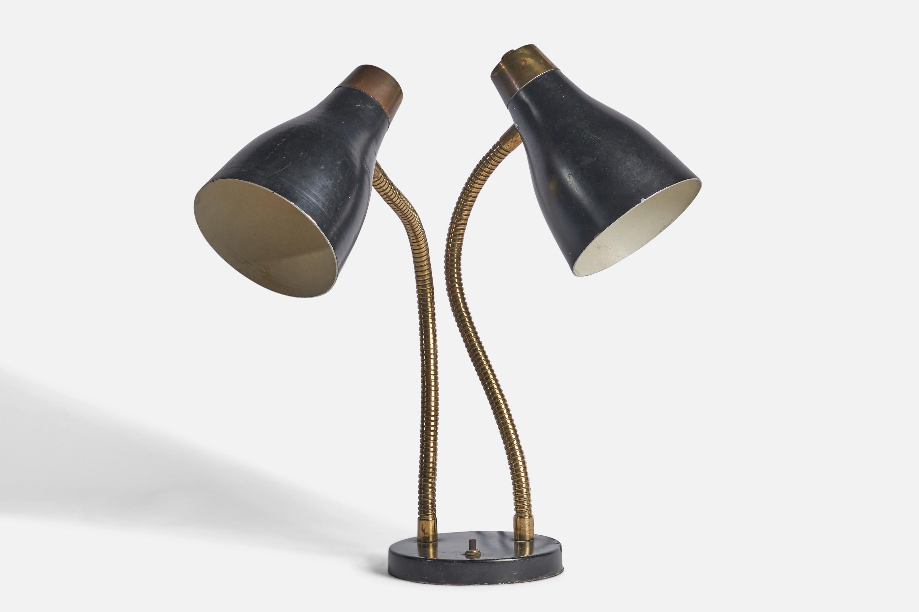 A brass and black-lacquered metal table lamp designed and produced in Sweden, c. 1940s.
Overall Dimensions (inches): 17” H x 17.5” W x 9” D
Bulb Specifications: E-26 Bulb
Number of Sockets: 2
All lighting will be converted for US usage. We are